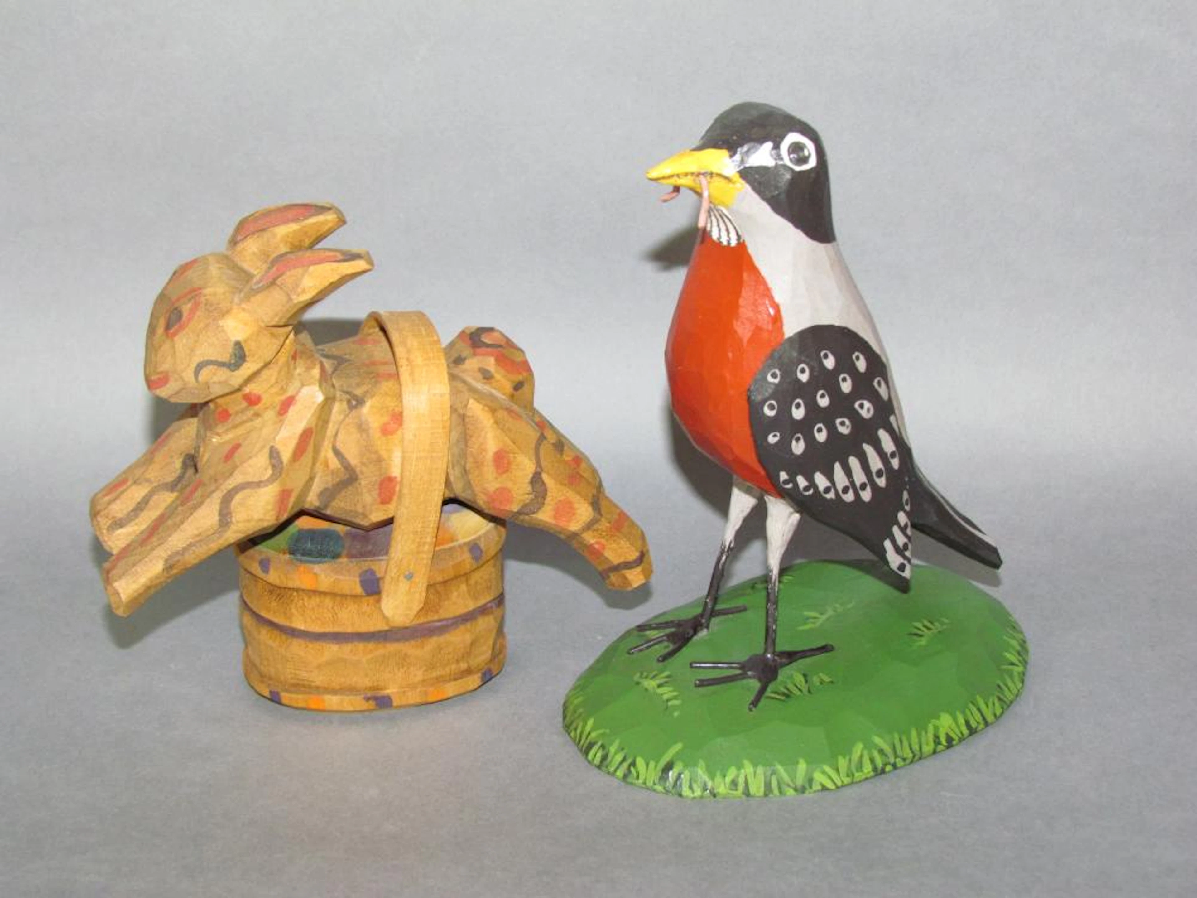 2 folk art carvings by Jonathan Bastia