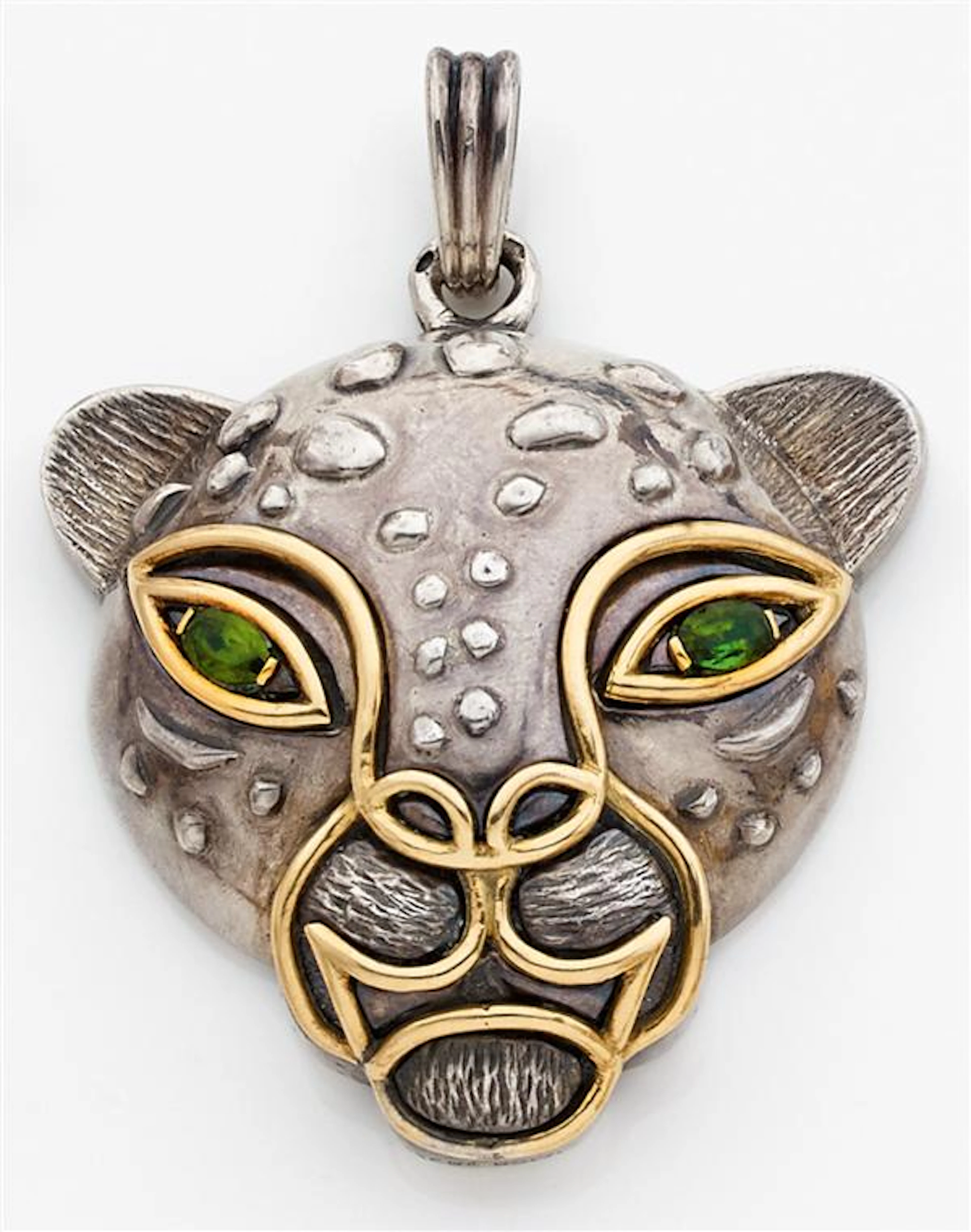 René BOIVIN Années 1980 Pendentif léopard Il représente une tête