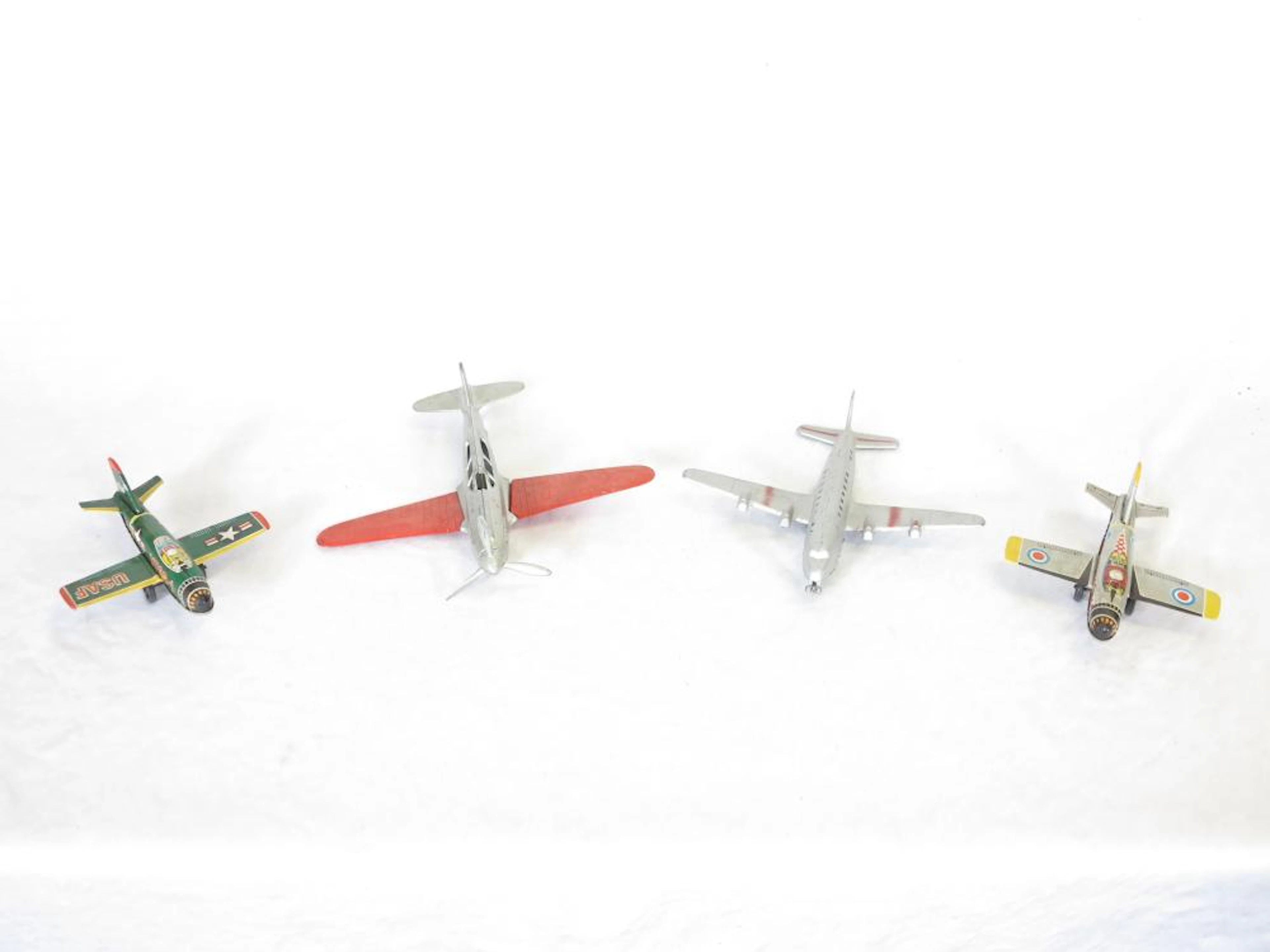 Group of 4 Tin Litho & Die Cast Toy Airplanes