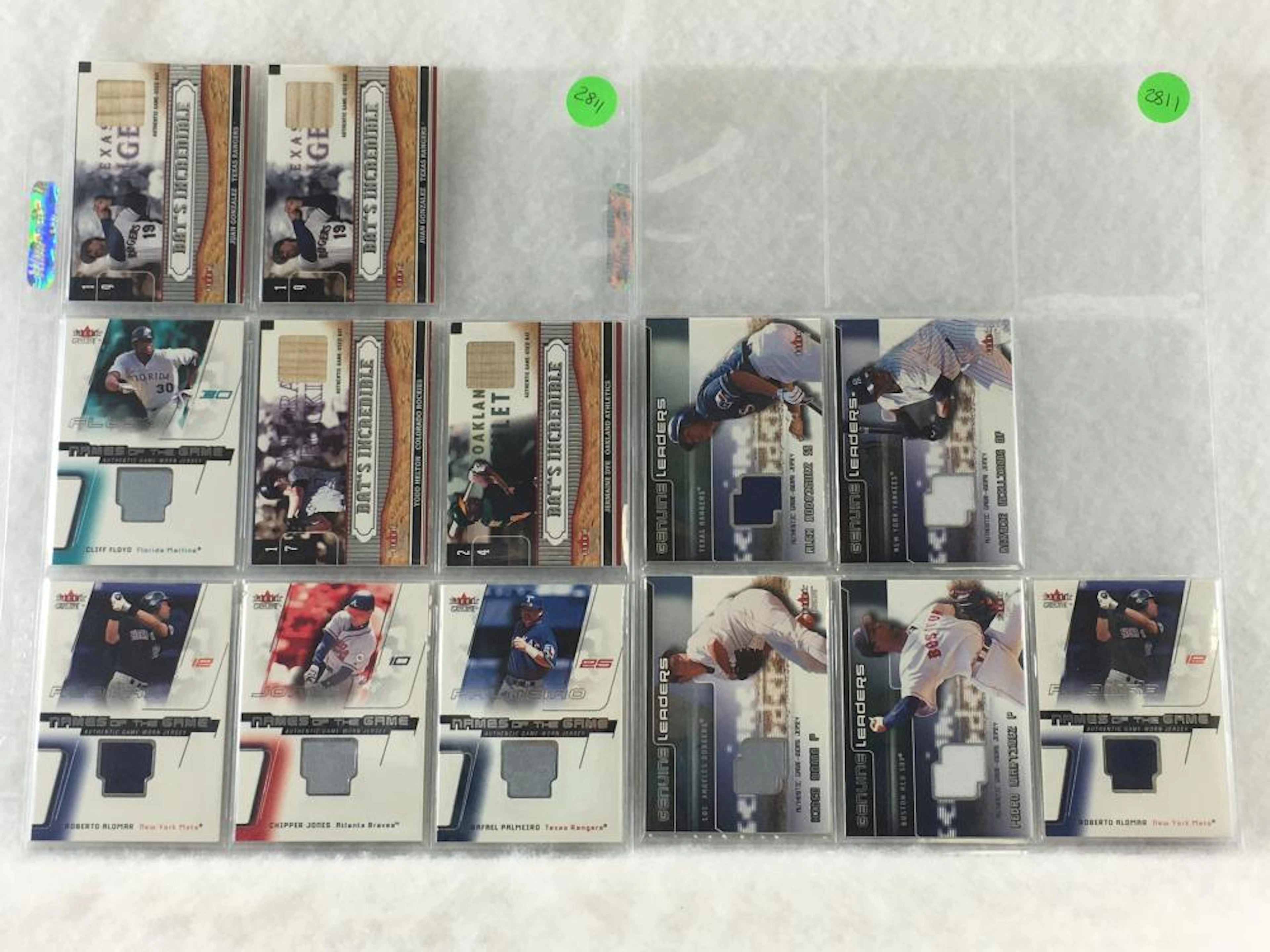 (13) 2002 Fleer Genuine Relic Game Used Jersey and Bat Baseball Cards