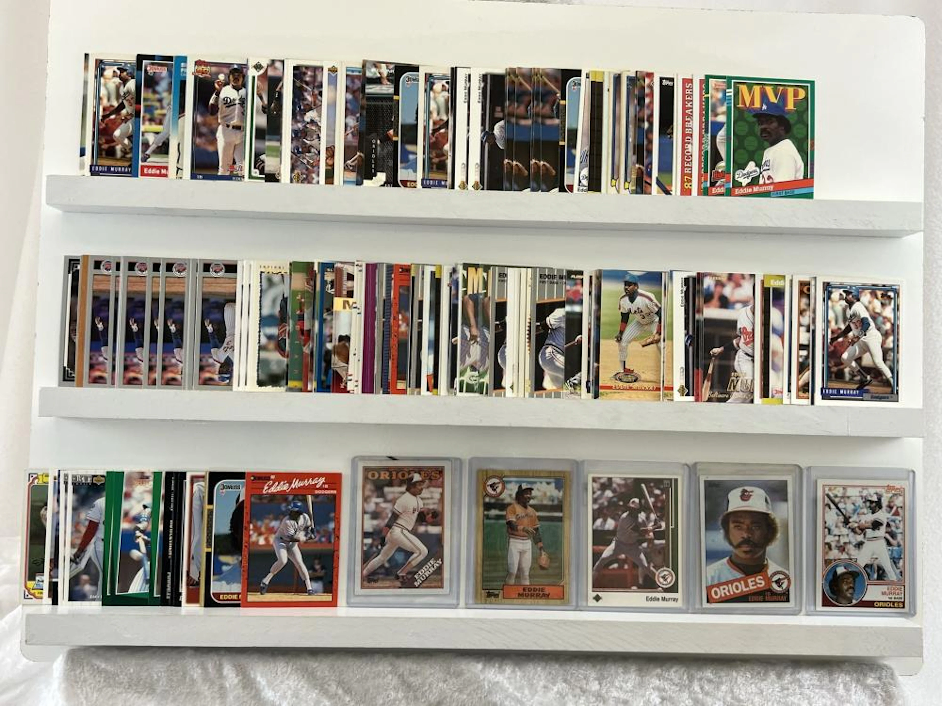 Eddie Murray Baseball Card lot 150 plus,HOF, various makes.