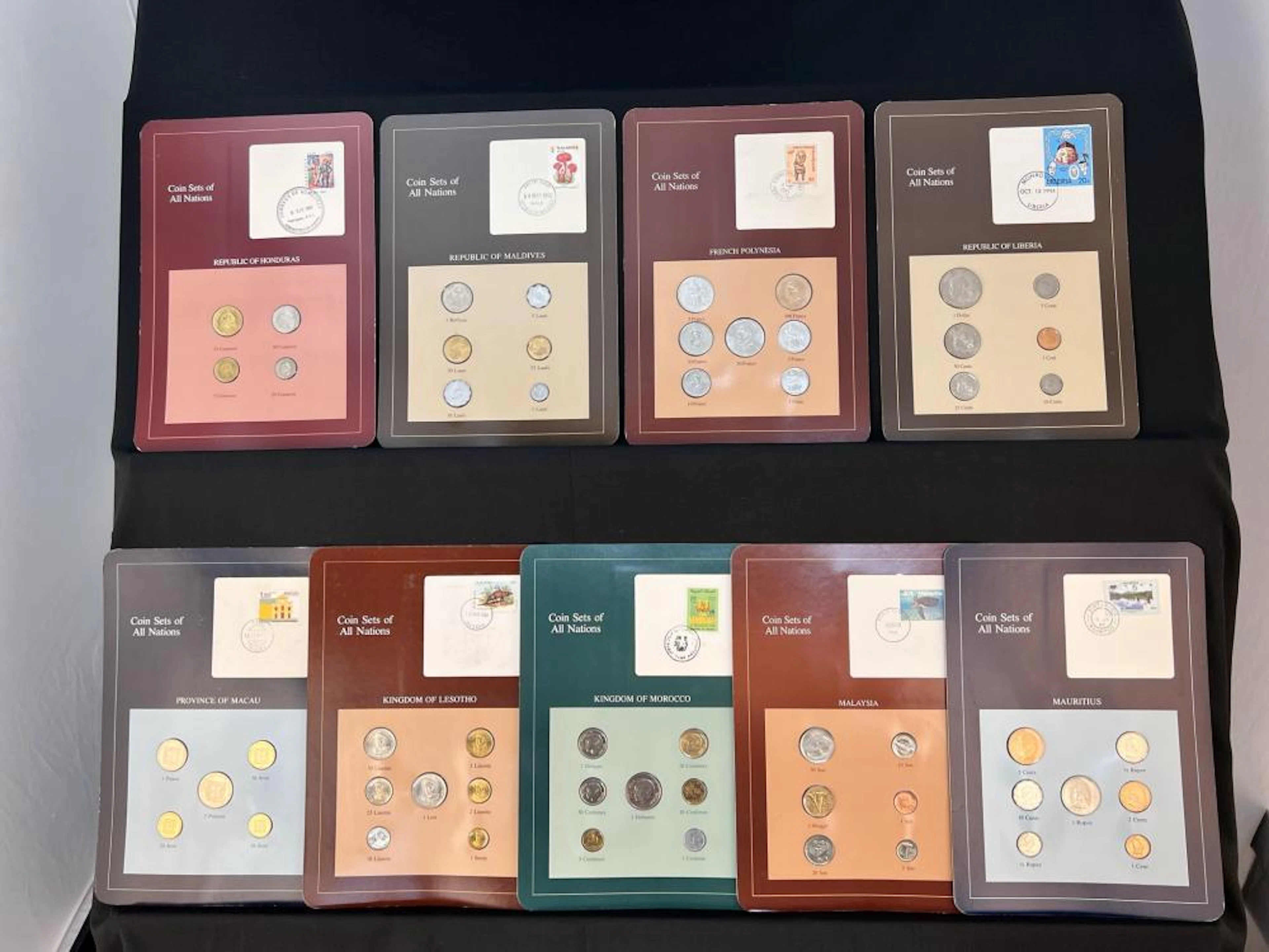 Franklin Mint Coin Sets of All Nations Coins and Stamps. , Lot of 9