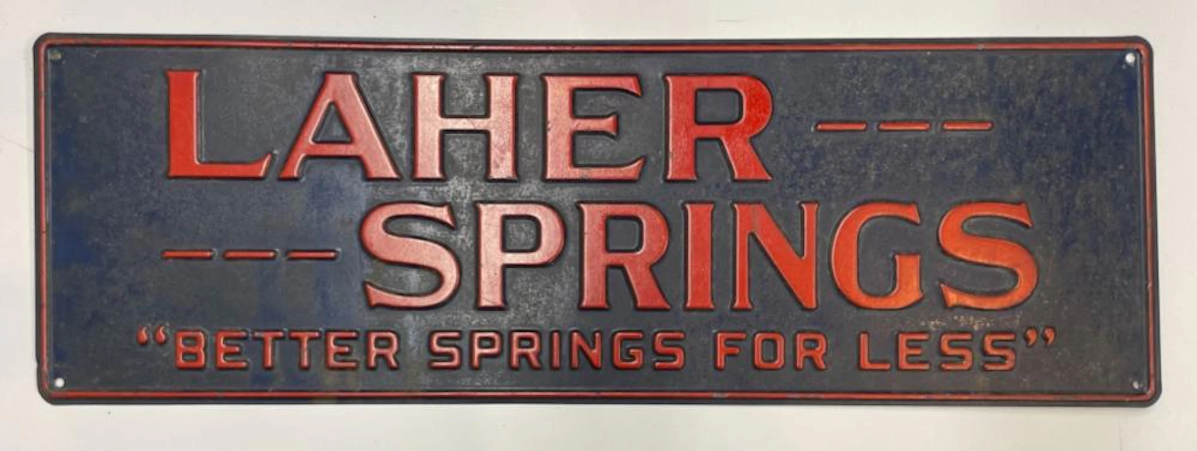 VINTAGE LAHER SPRINGS EMBOSSED METAL SIG