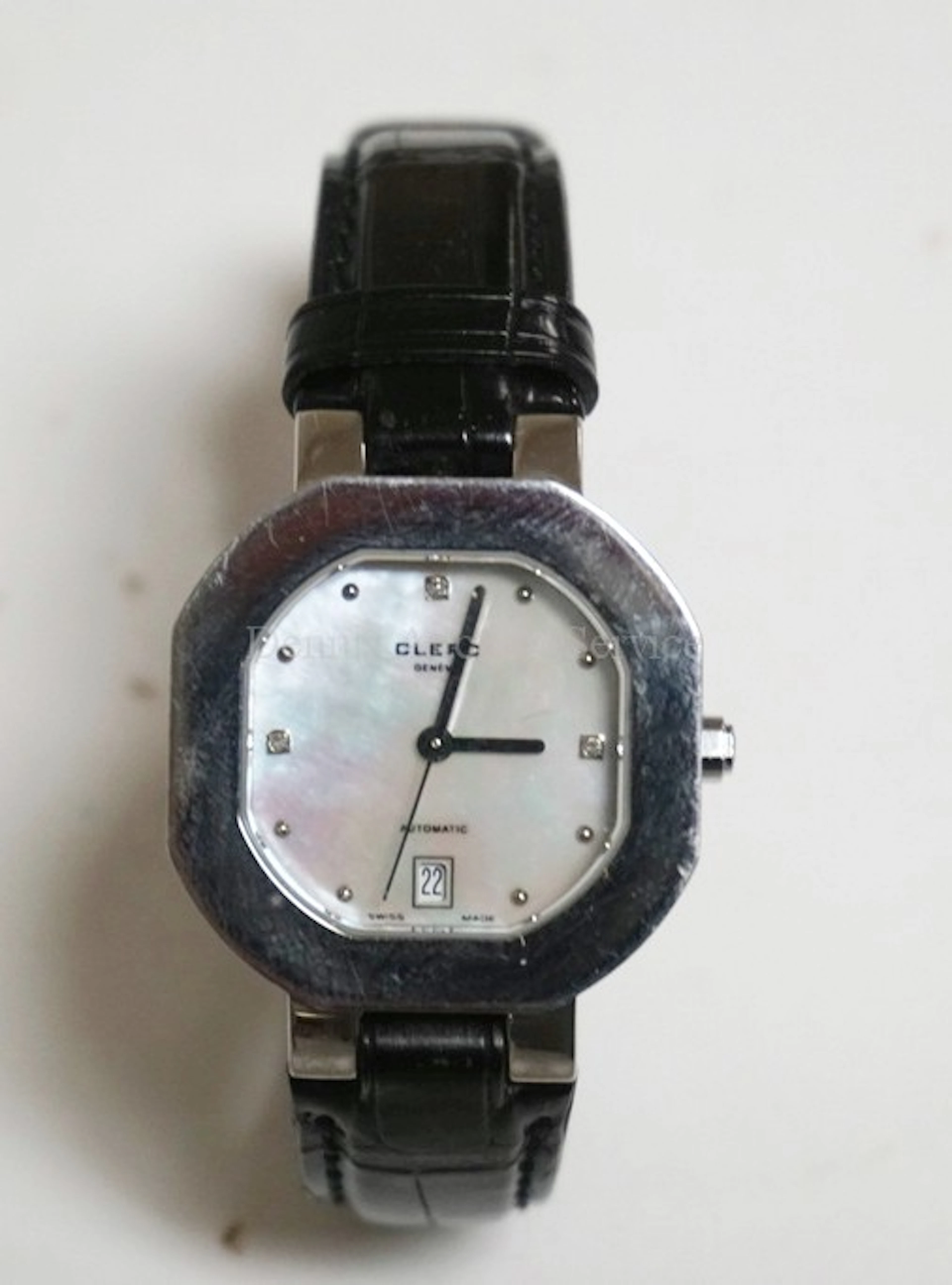 CLERC AUTOMATIC WATCH. MOTHER OF PEARL FACE WITH DATE.