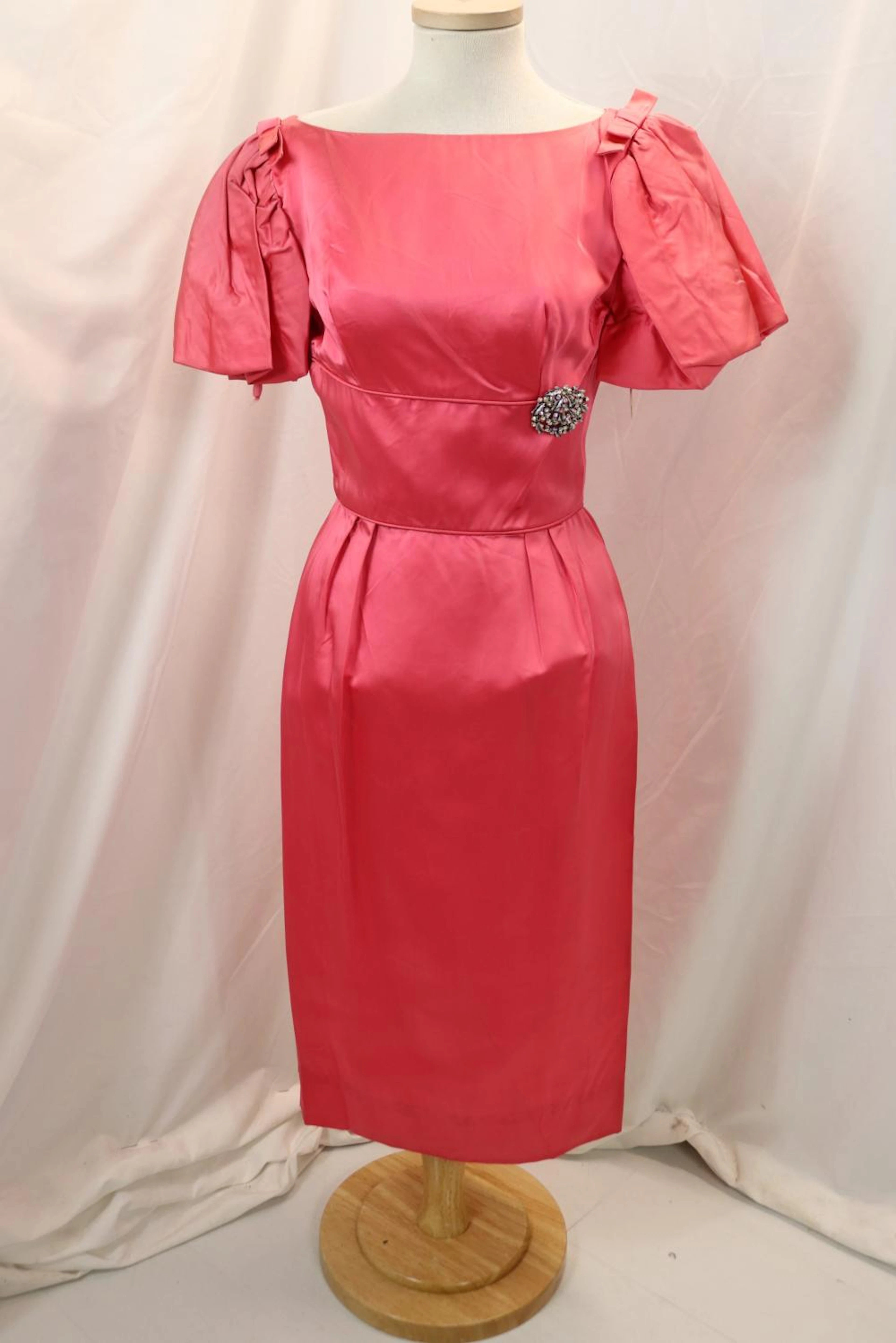 vintage 1950's pink satin wiggle dress with rhinestone brooch, old store stock