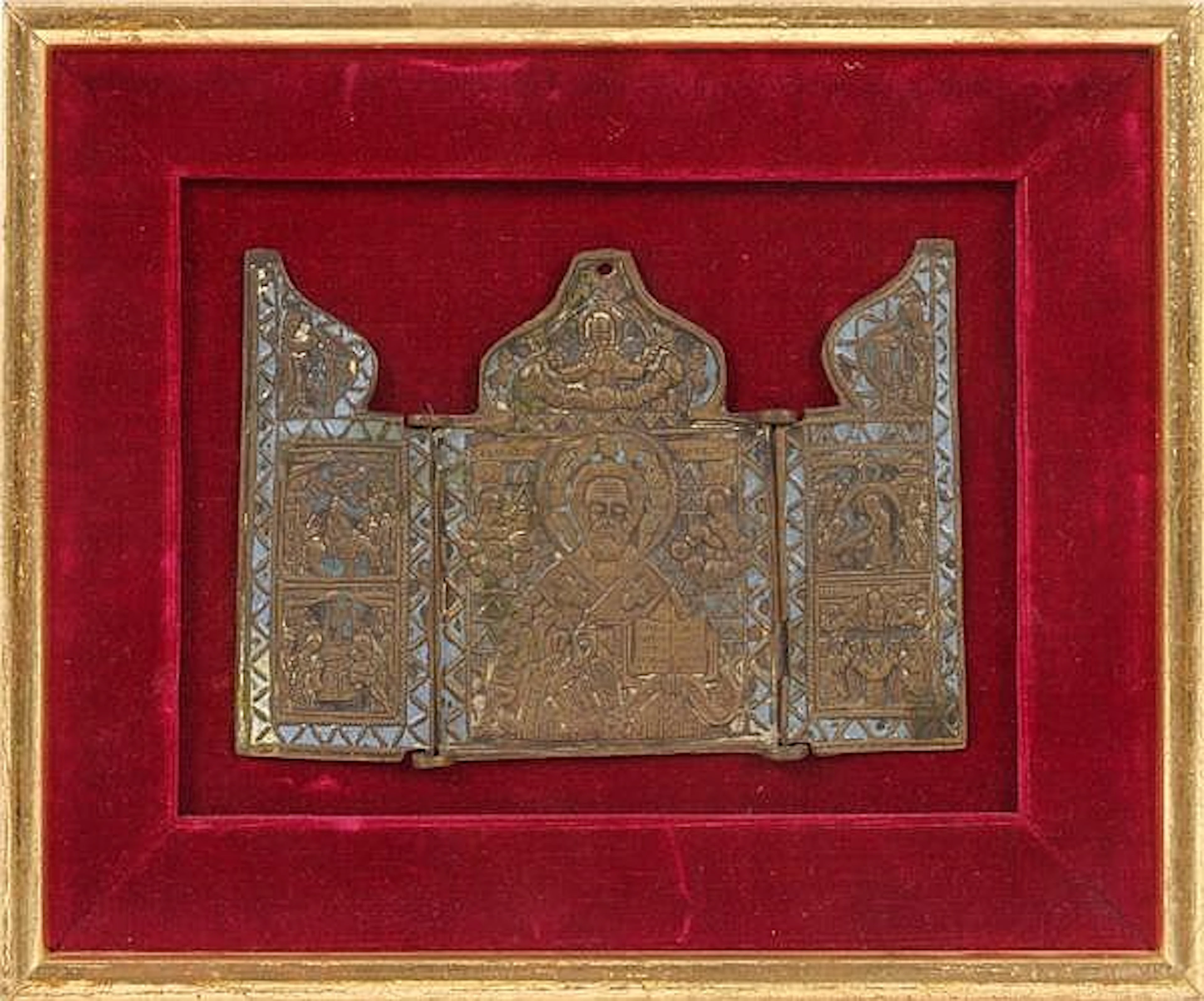 RUSSIAN ENAMELED PORTABLE TRIPTYCH ICON. 17th c. (?) Russian enameled metal Byzantine icon triptych, opens to reveal St. Nicholas center, left panel with angel of the Annunciation above, Entry into Je