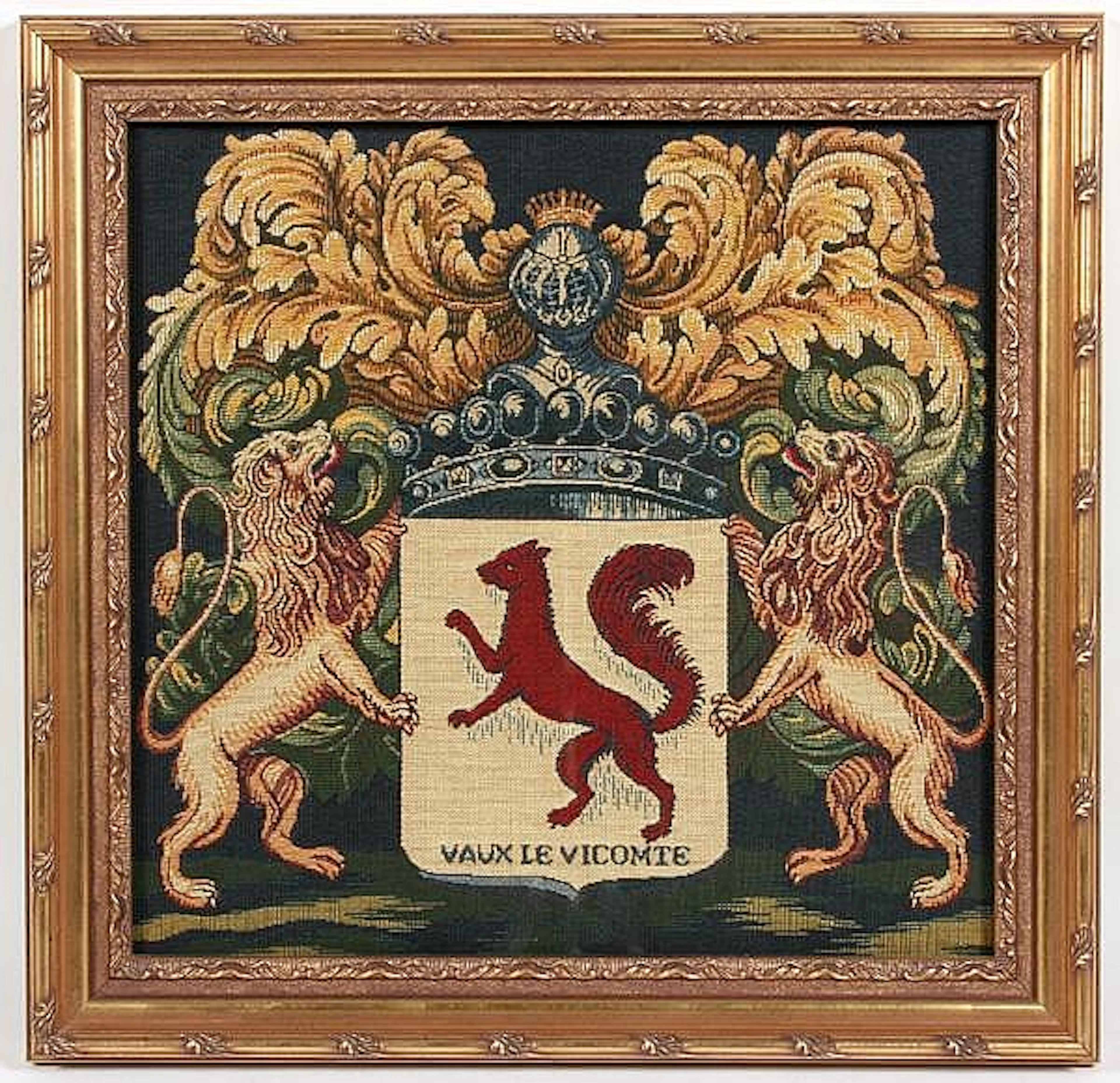 FRENCH TAPESTRY PANEL. French machine woven tapestry panel of heraldic shield with rampant lions, knight's helmet and acanthus inscribed Vaux Le Vicomte, framed under glass. No mark. Size: 22 1/4''H, 