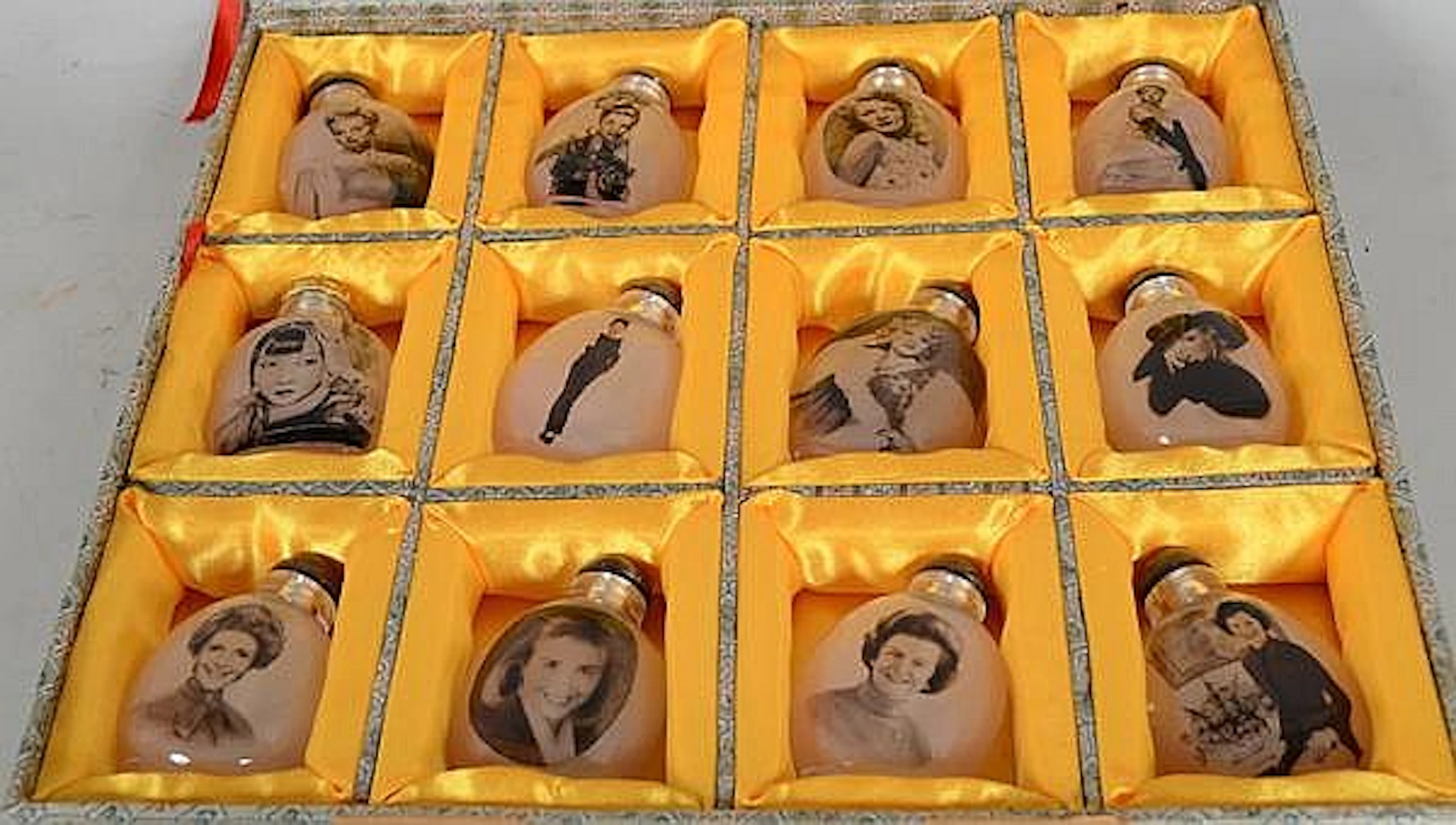 12 HOLLYWOOD AND FIRST LADY IMAGE REVERSE PAINTED SNUFF BOTTLES. Lot of reverse painted snuff bottles includes images of Mae West, Dorothy Lamour, Audry Hepburn and four First ladies. Condition: age a