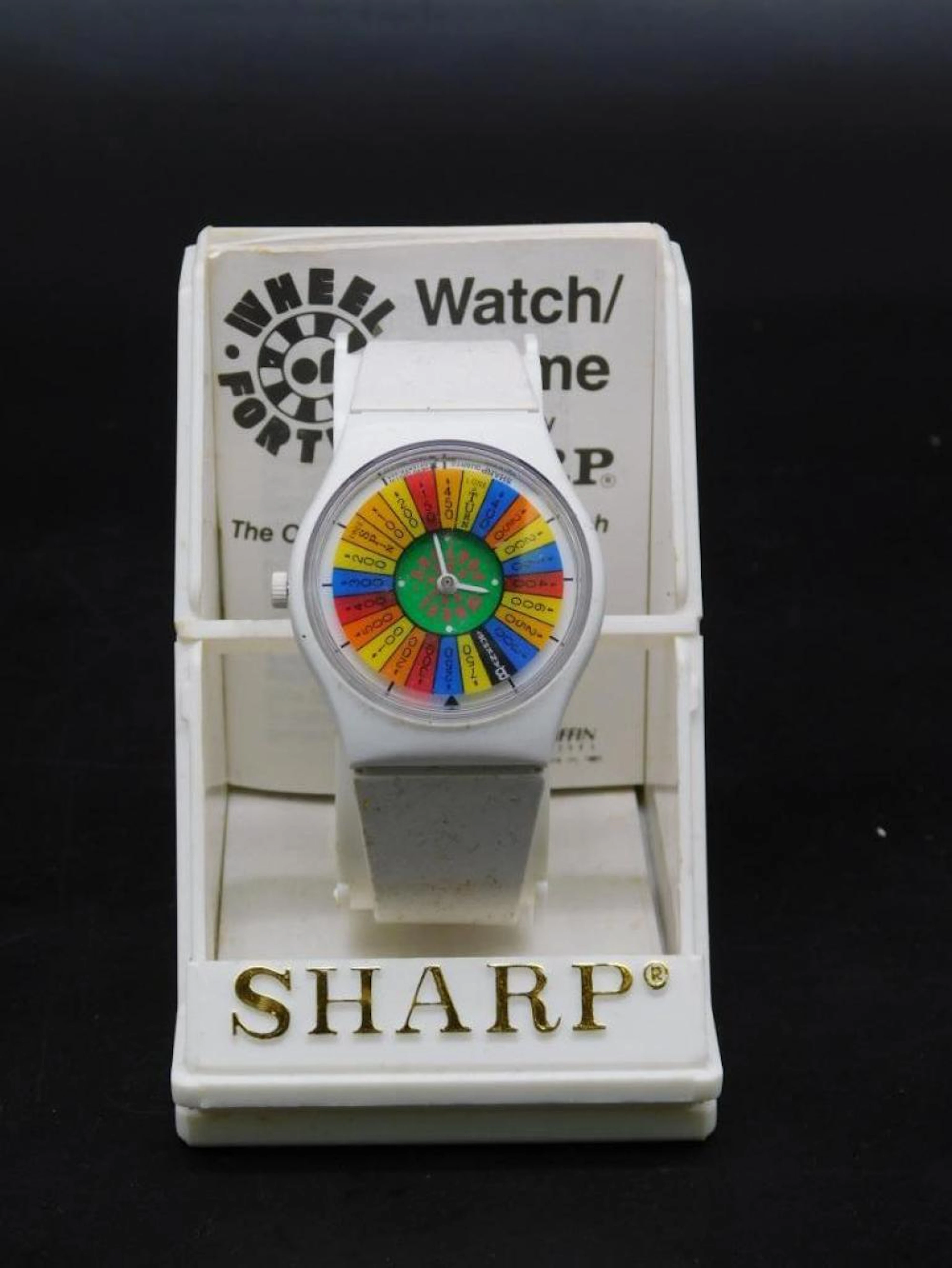 WHEEL OF FORTUNE WATCH BY SHARP VINTAGE JEWELRY COLLECTIBLE