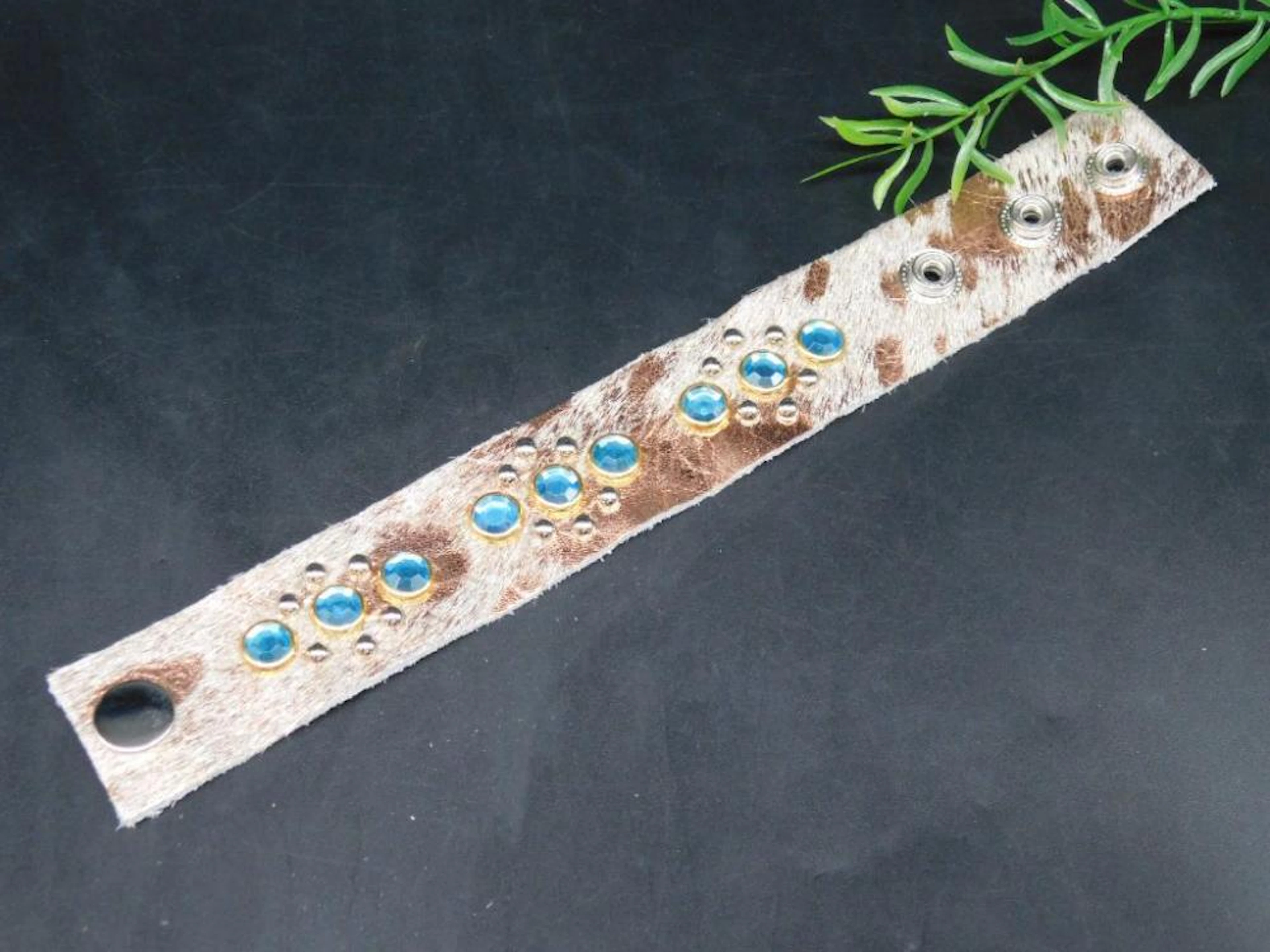 STUDDED COWHIDE CUFF BRACELET