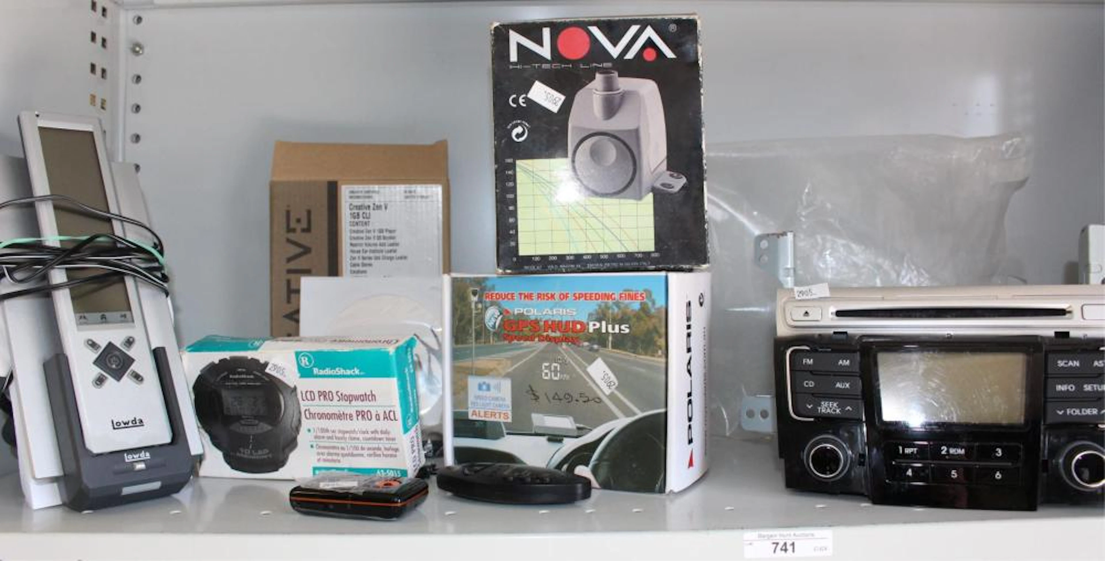 Shelf lot assorted items incl. a car CD radio