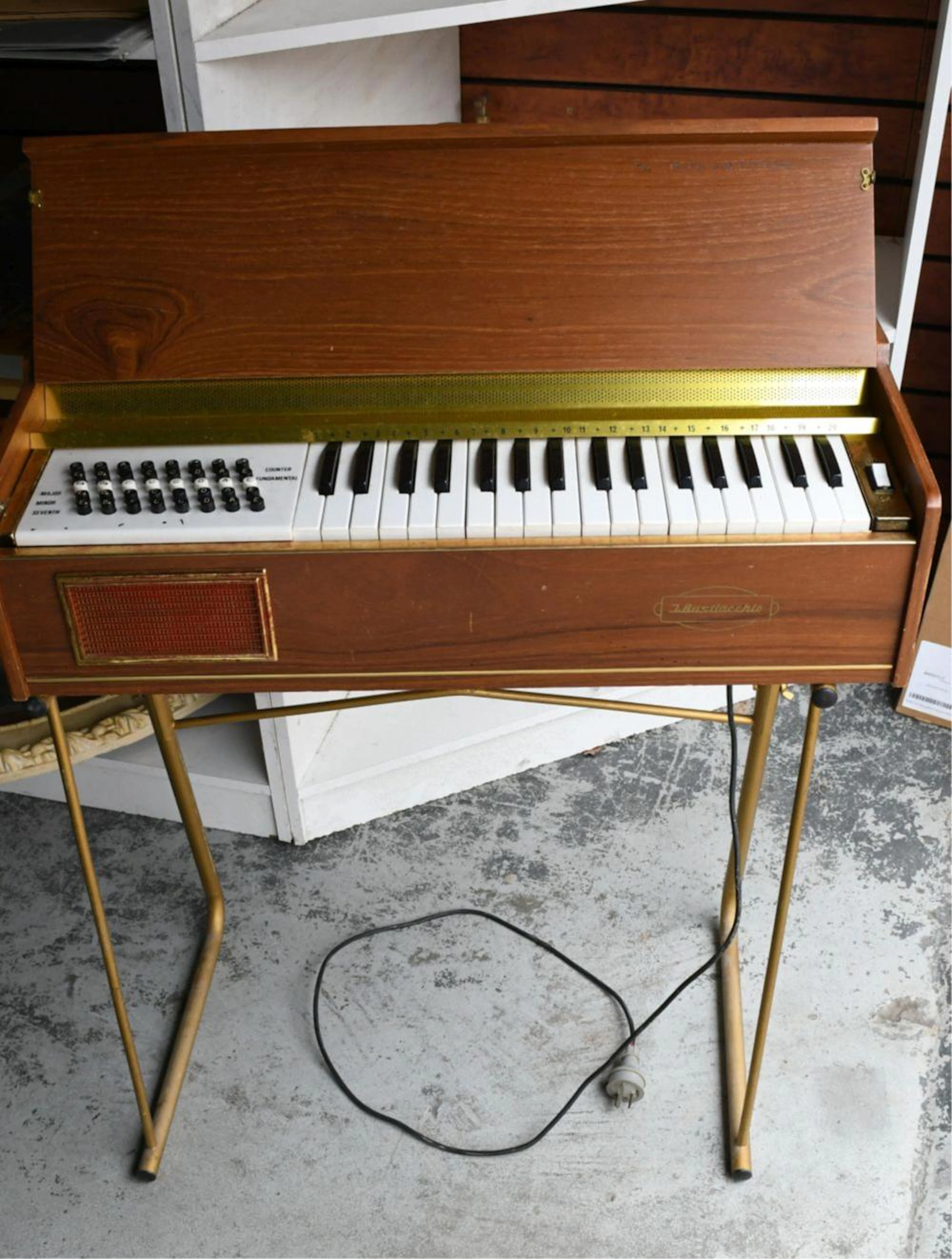 Vintage electric organ by J Busilacchio,