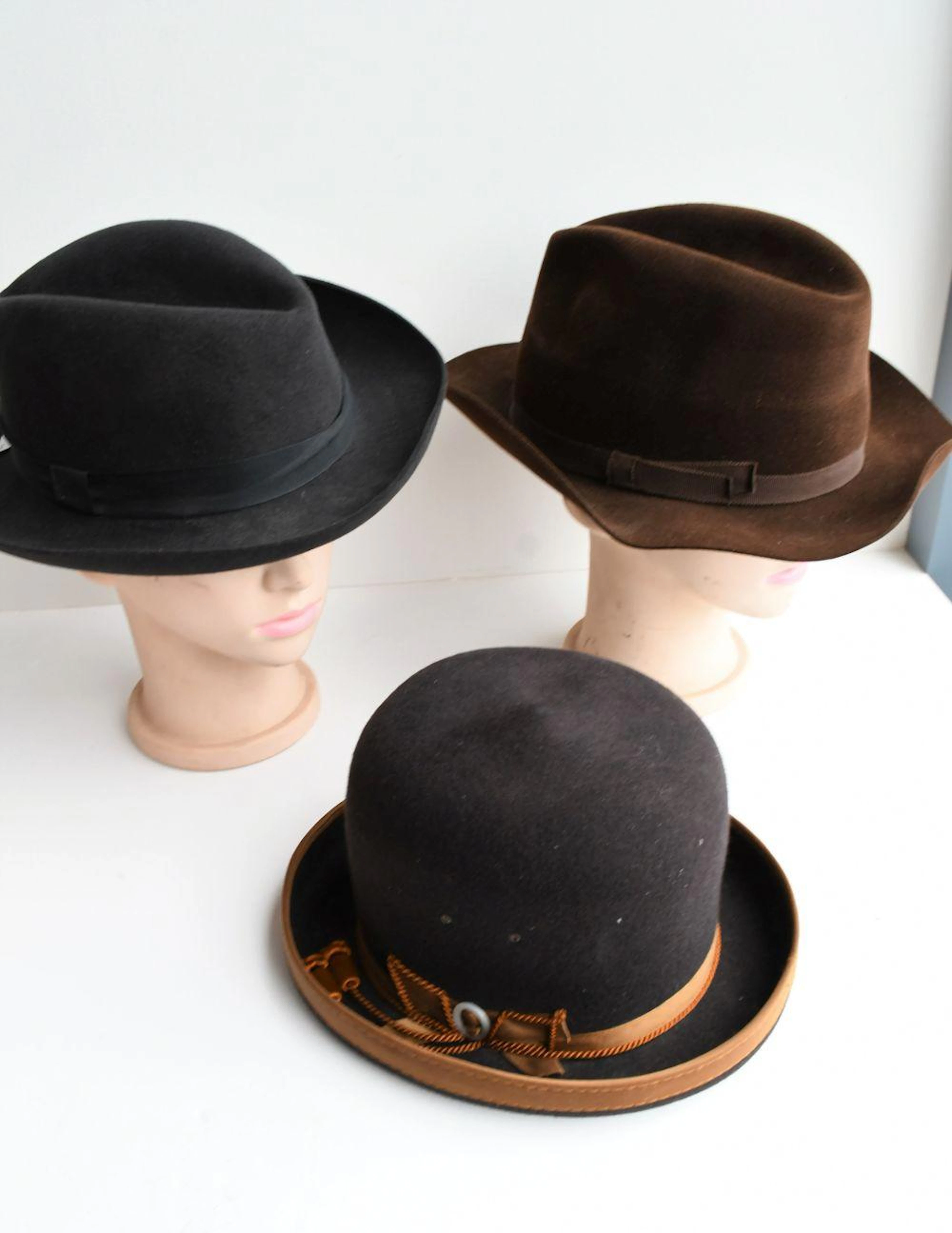 Three vintage mens hats,