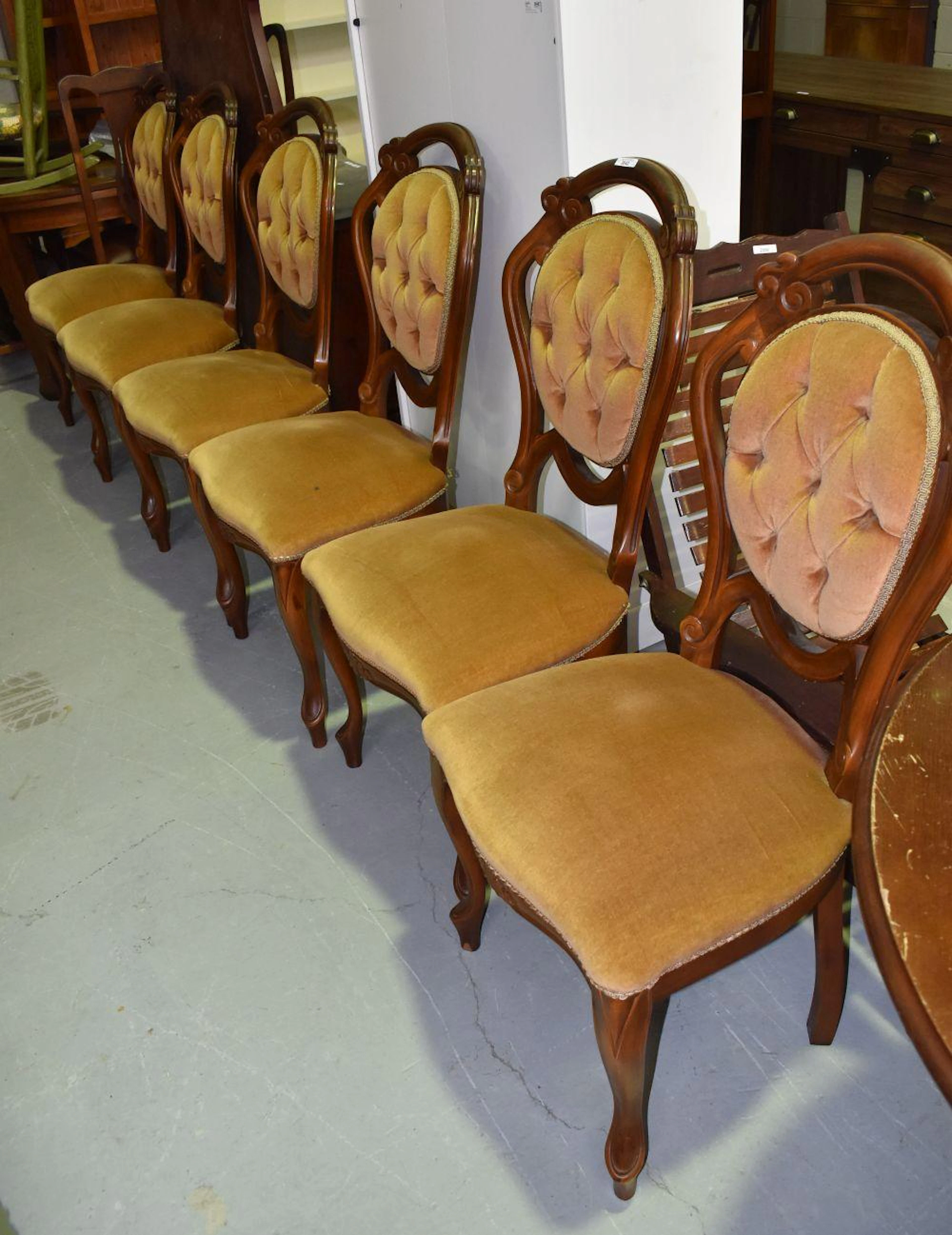 Set of six European style walnut dining chairs,