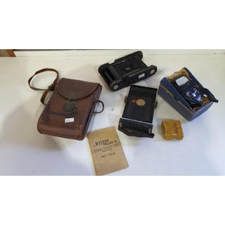Kodak camera; leather camera case; Weston Master exposure...