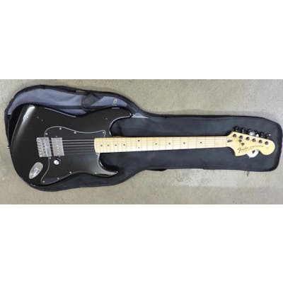 Fender Stratocaster electric guitar, ?Tom Delonge? model, with soft case