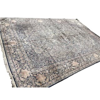 A large vintage Persian carpet