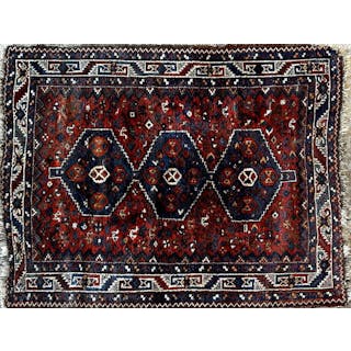 Antique Afghan rug with three blue medallions and various...