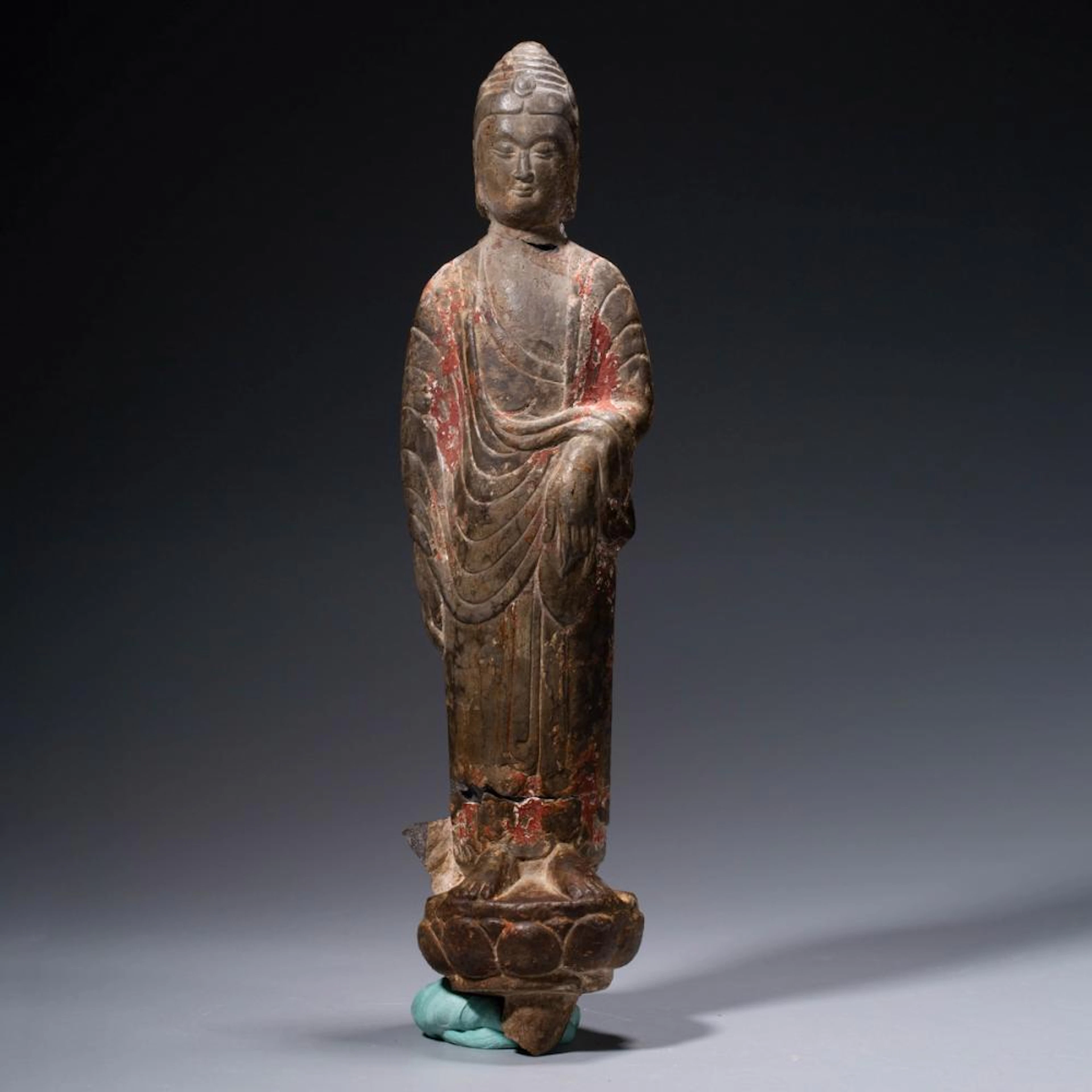 A Colored Drawing Stone Buddha Statue