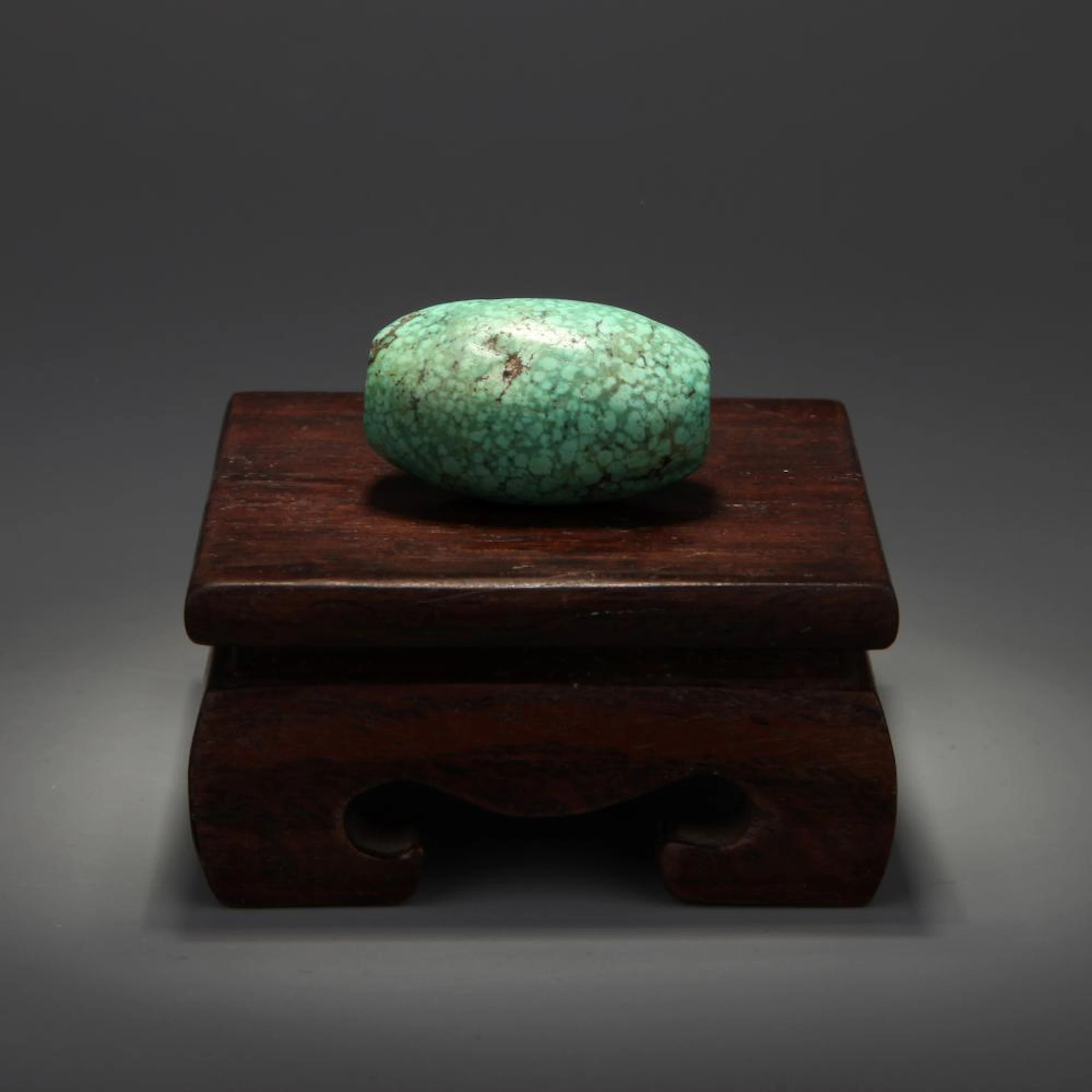 TURQUOISE CARVED CHILD PENDANT
