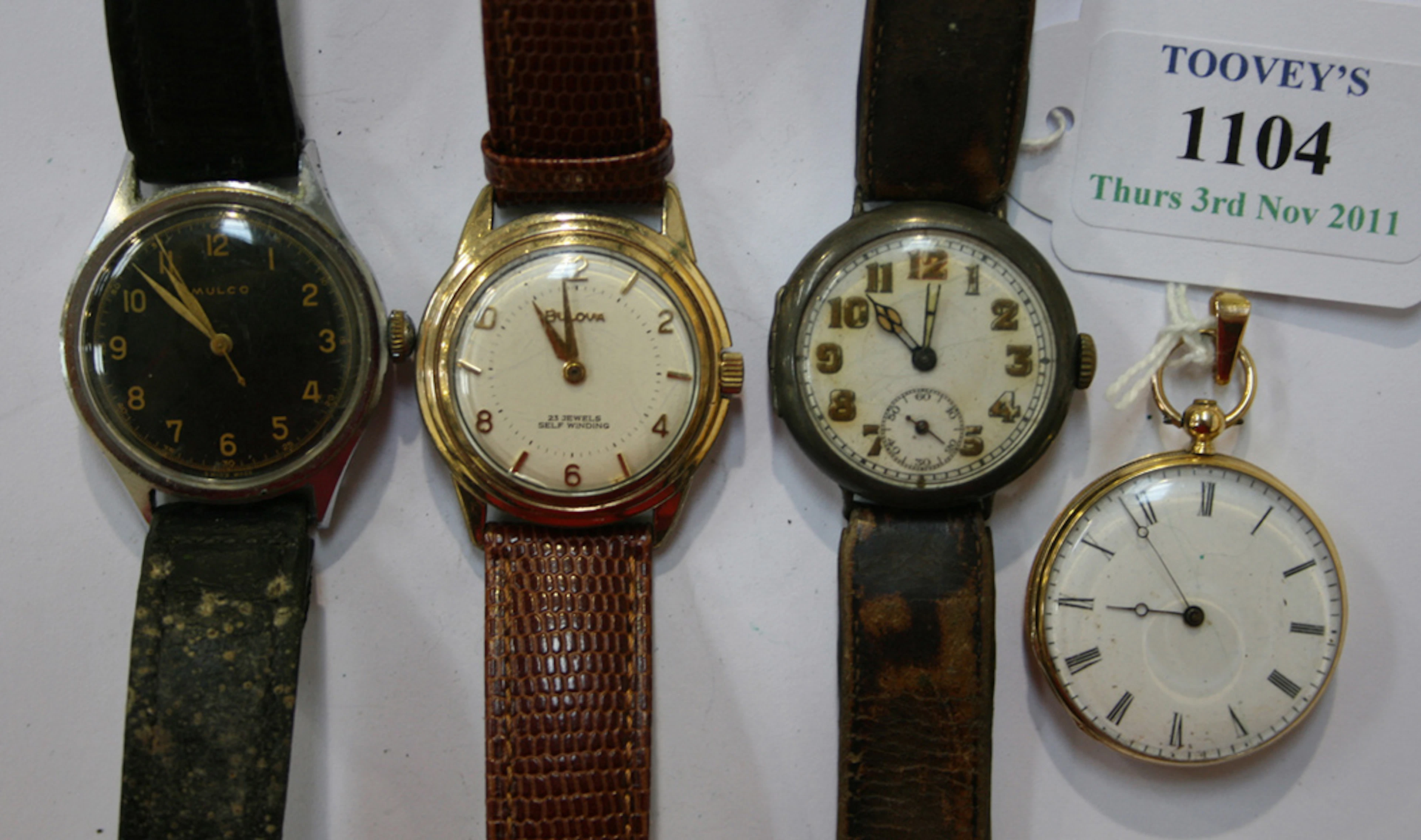 A GOLD CASED OPEN-FACED LADY'S FOB WATCH WITH A GILT CYLINDER MOVEMENT