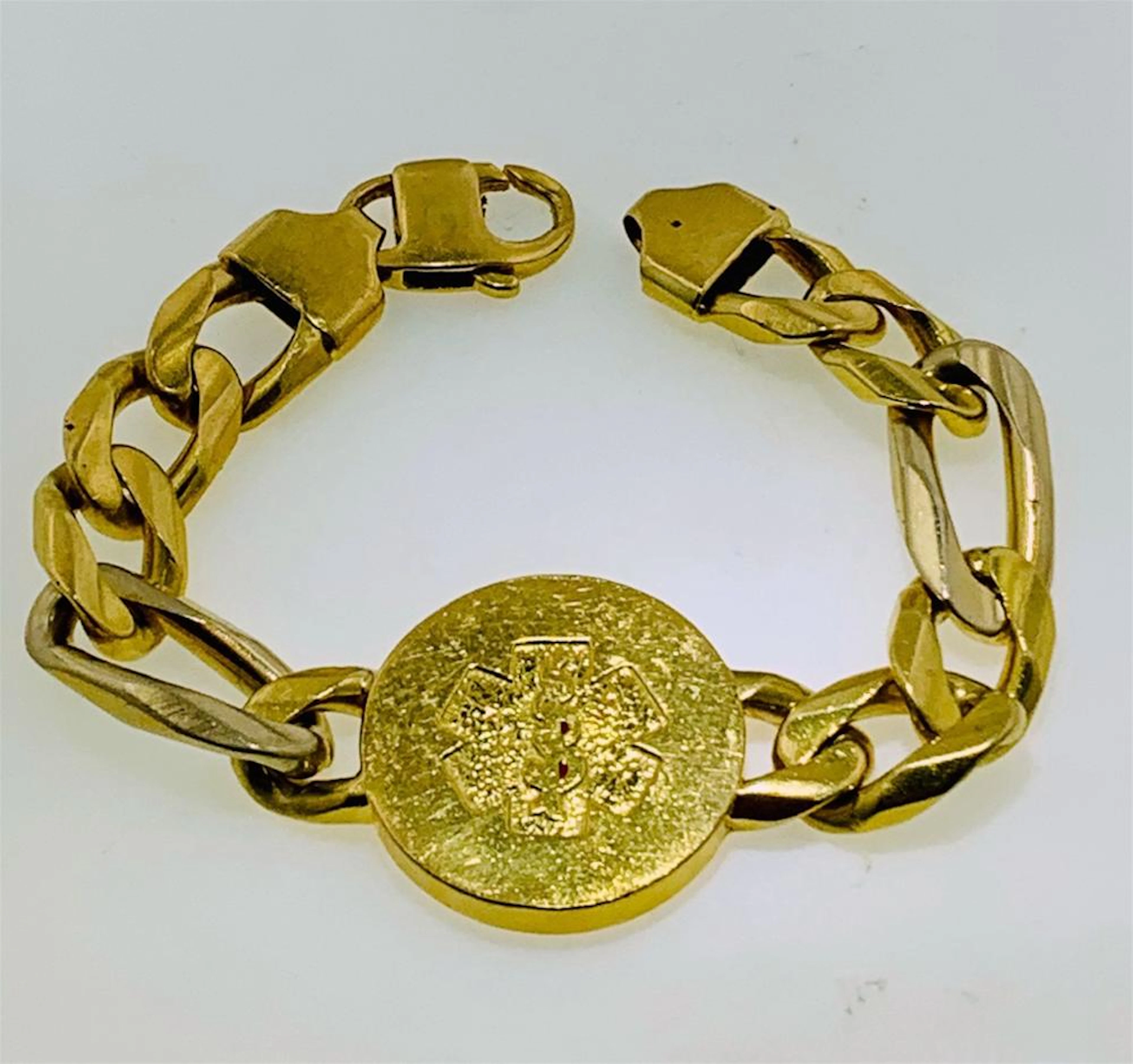 18KT GOLD MEDIC ALERT BRACELET (100.50 GRAMS)