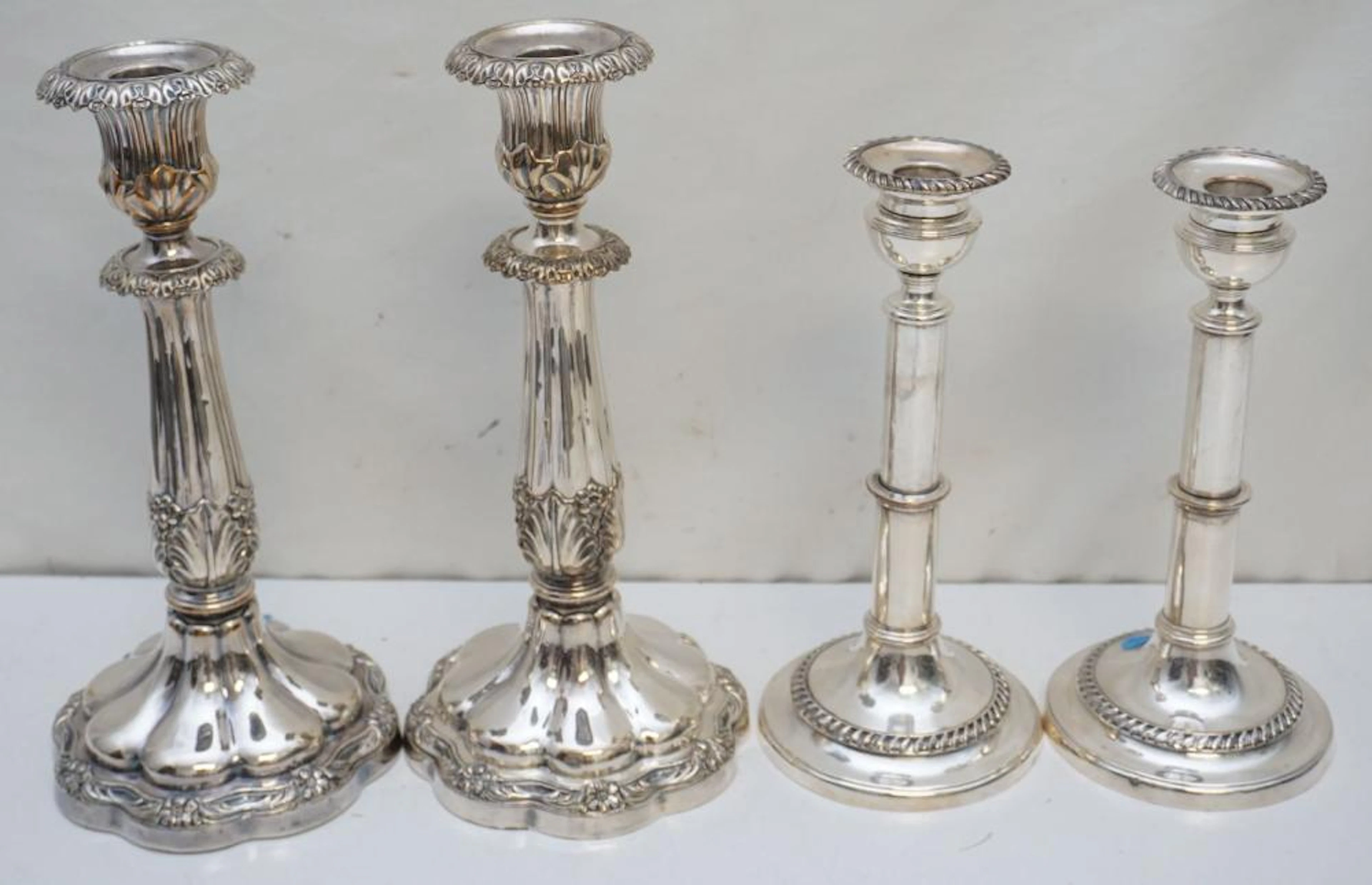 2 PAIR ANTIQUE SILVER PLATED CANDLESTICKS