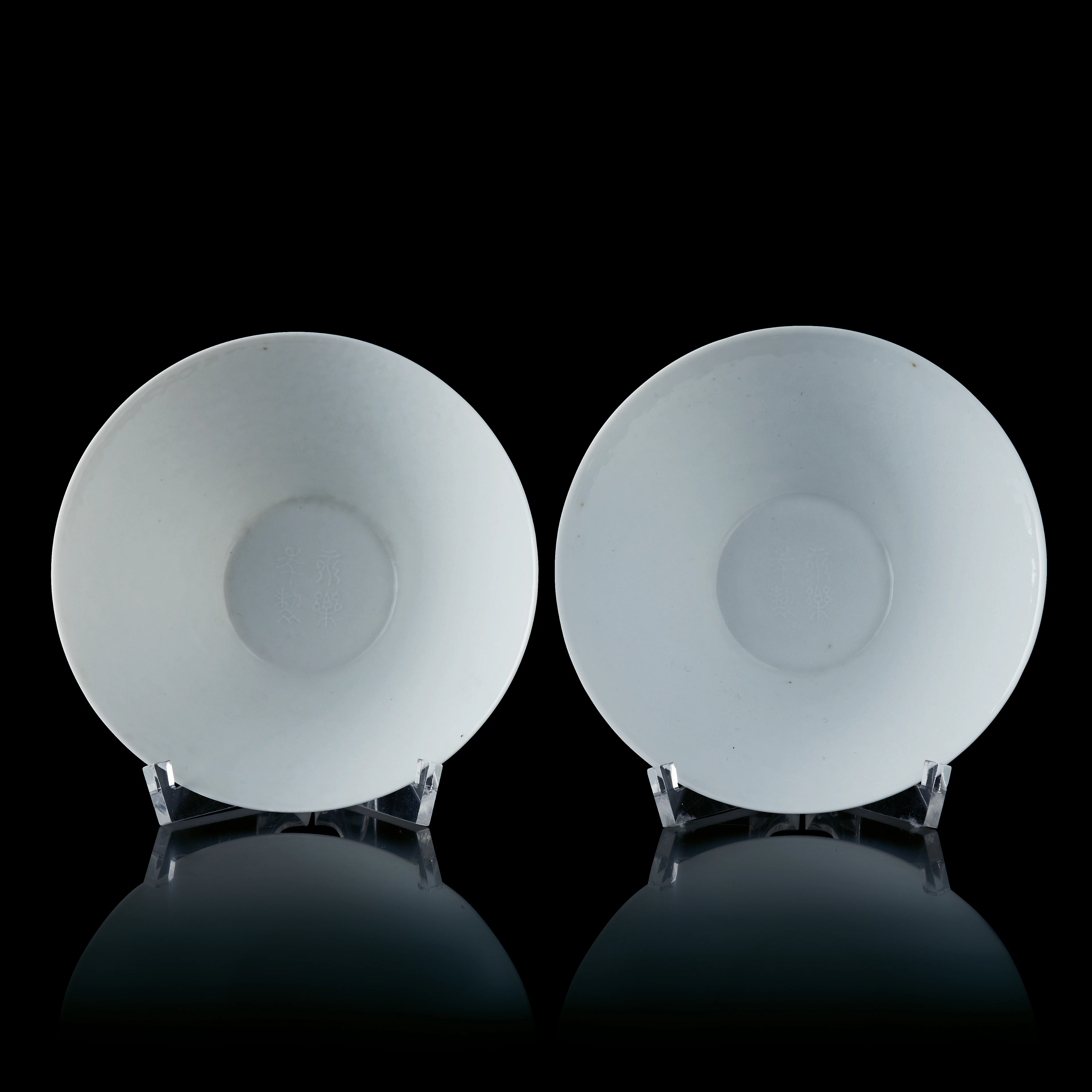 A Pair of Fine White-Glazed Anhua Bowls