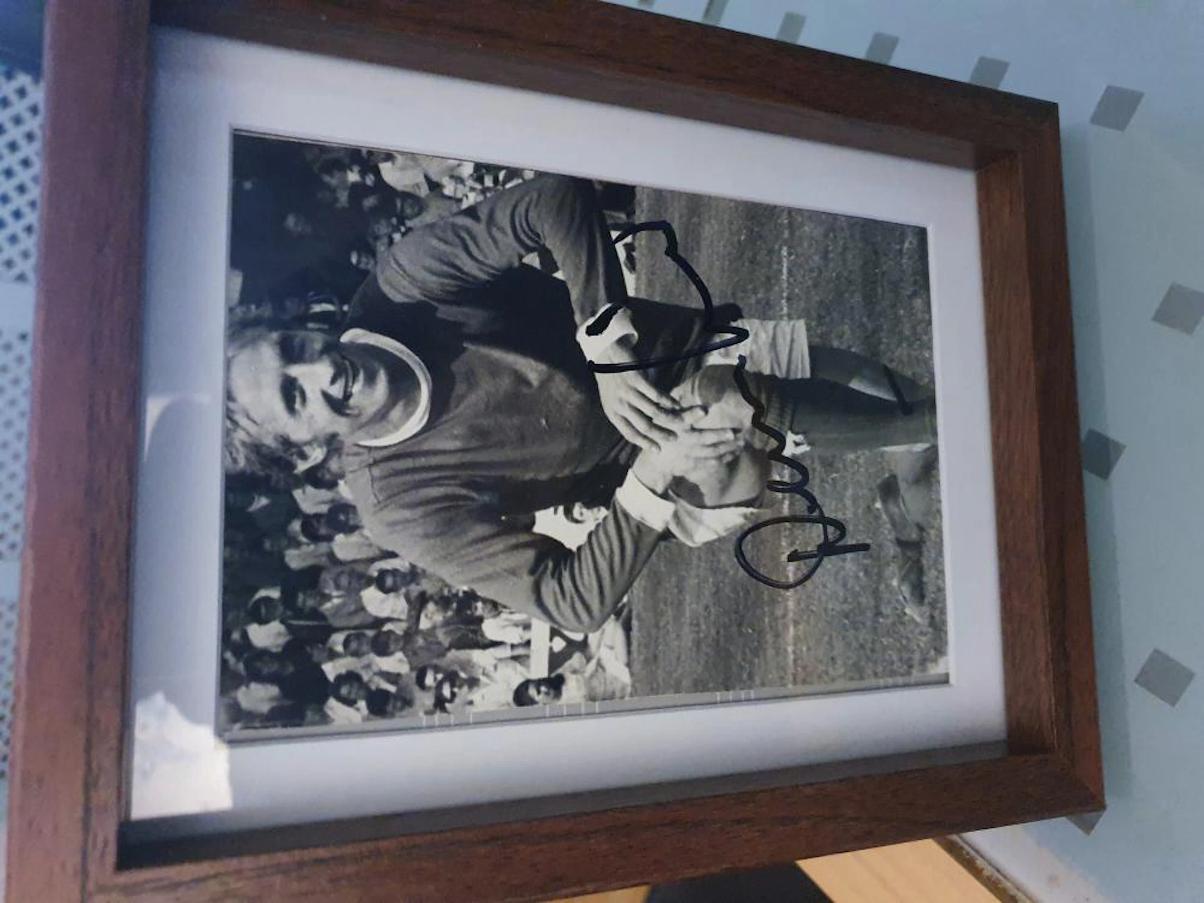 Lot 33 - Signed Photo of Denis Law which he has signed and comes in frame