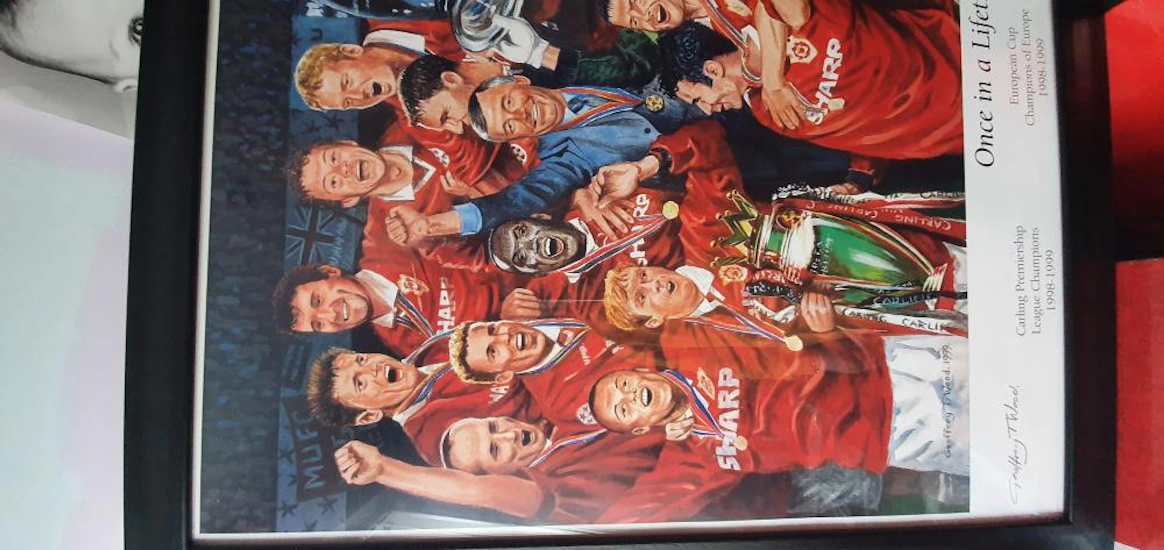 Lot 79 - Manchester United Mission Impossible Framed Picture in Brown Frame