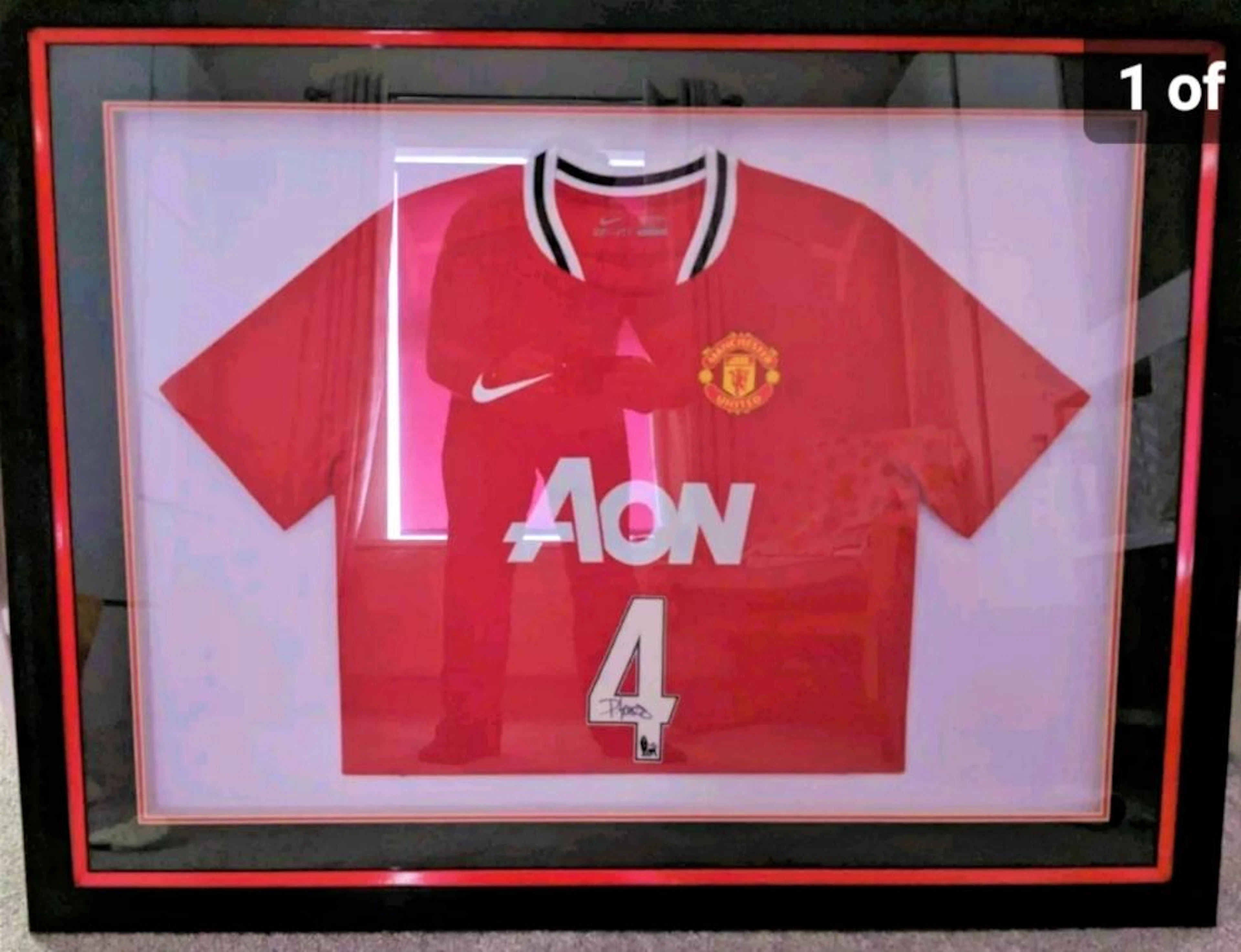 Lot 92: Signed and framed Phil Jones Manchester United Football Shirt