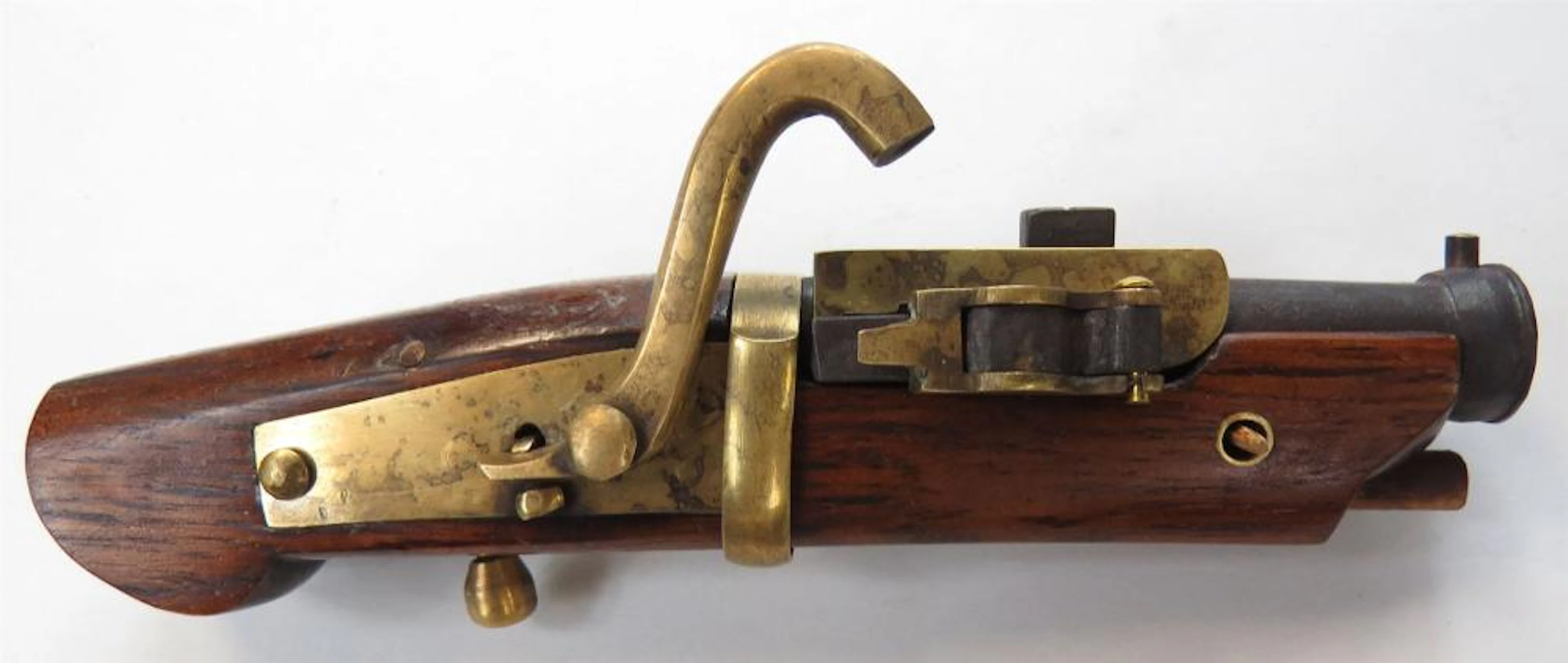 A JAPANESE TANEGASHIMA TANTUTU NETSUKE