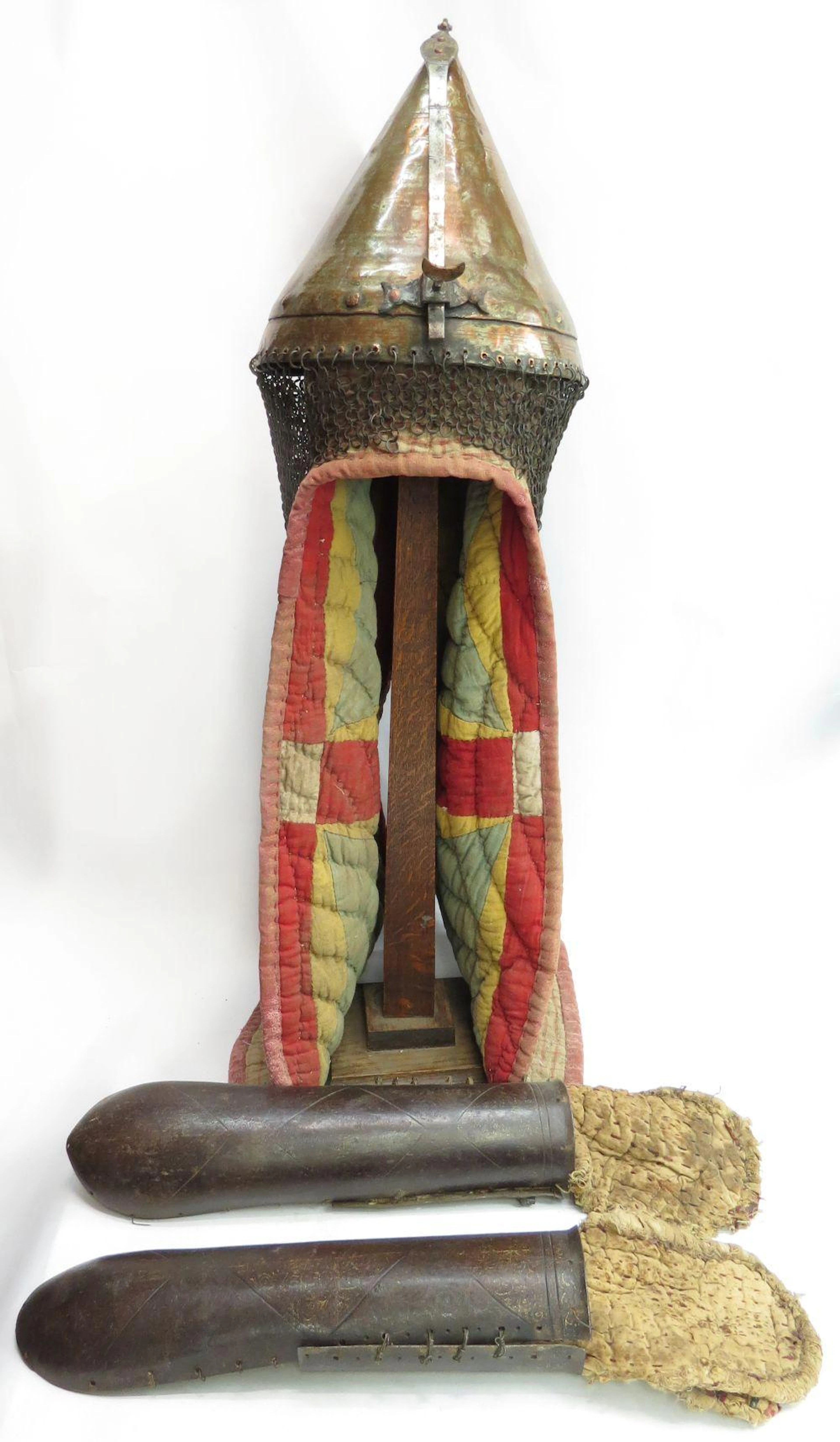 AN IMPORTANT SUDANESE HELMET AND ARM GUARDS ARMOR