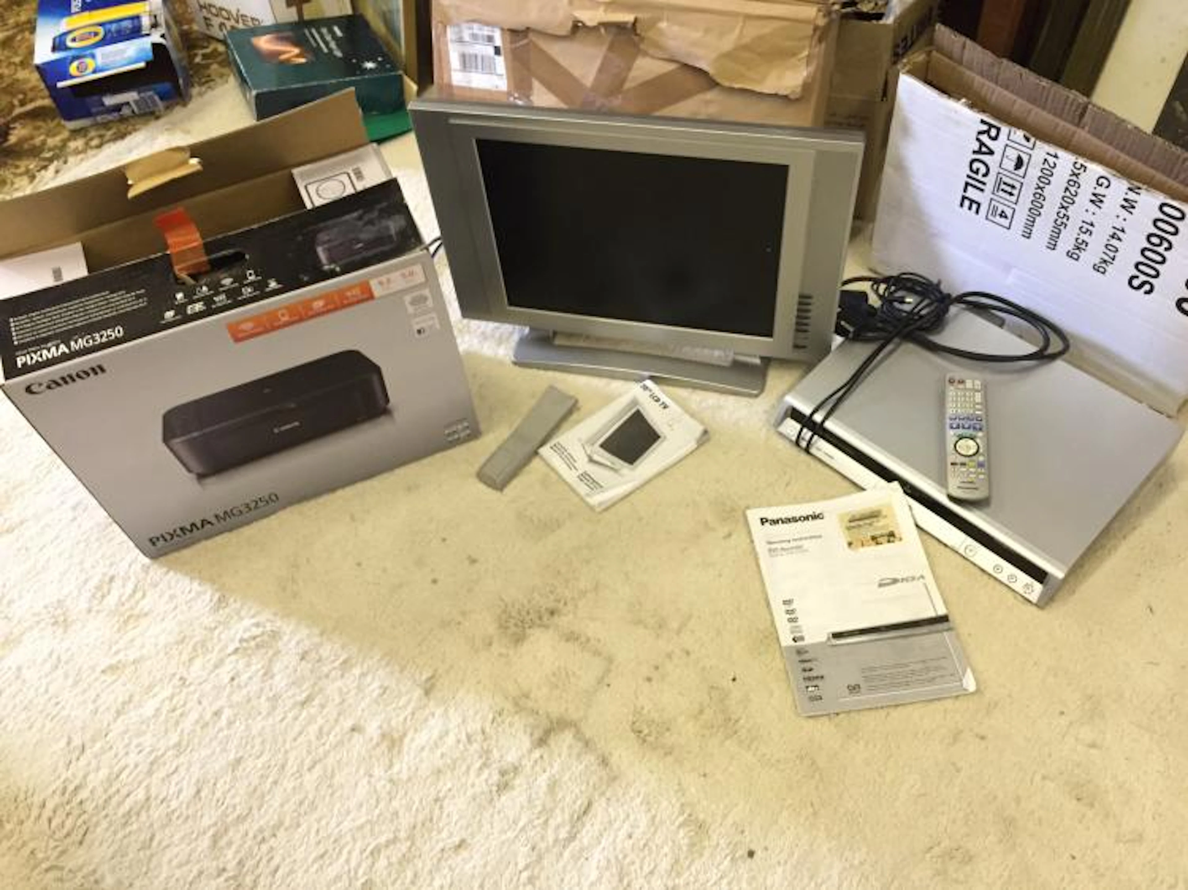*A Cannon printer, a TV and a dvd player.
