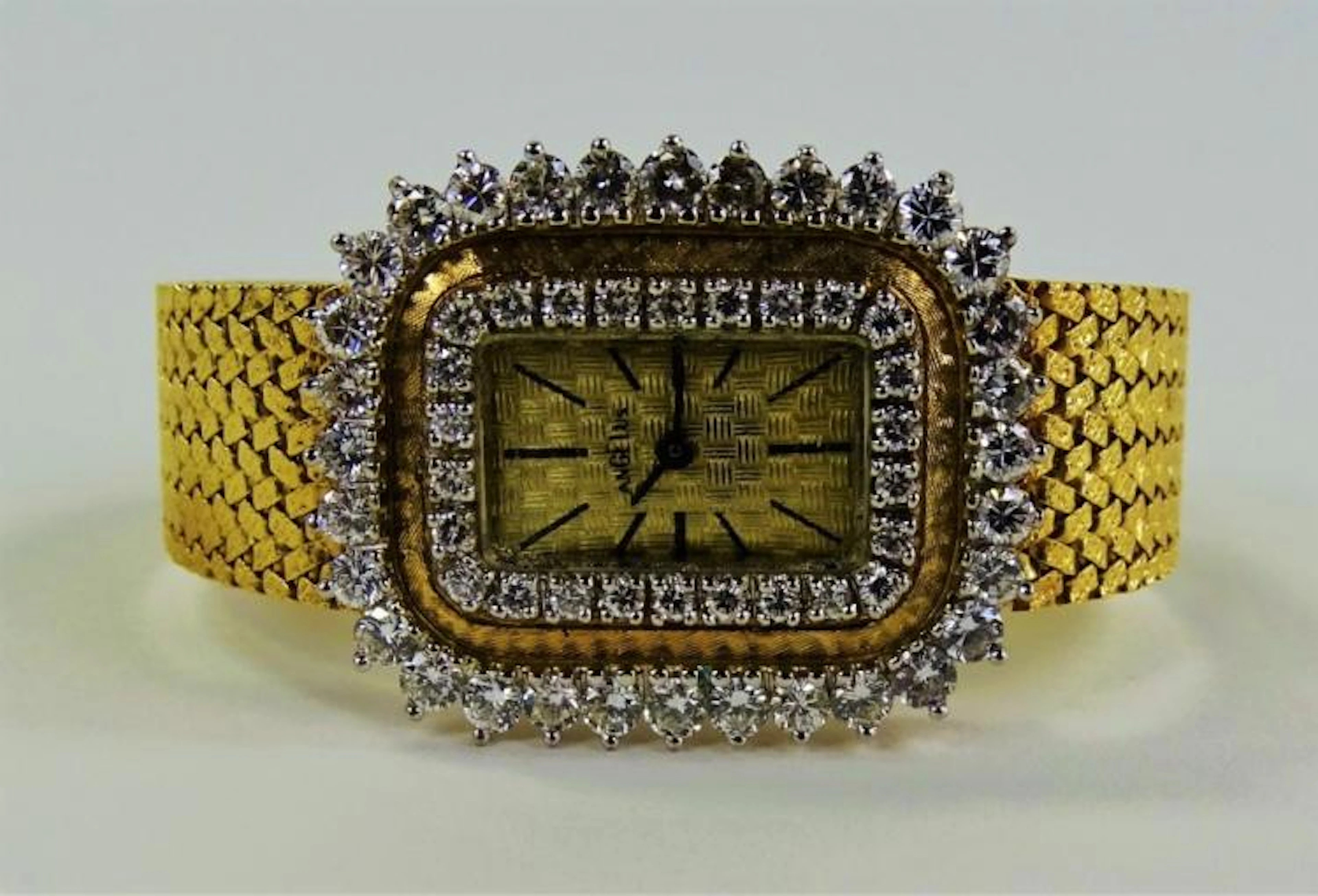 LADYS VINTAGE ANGELUS 14KT GOLD DIAMOND WATCH