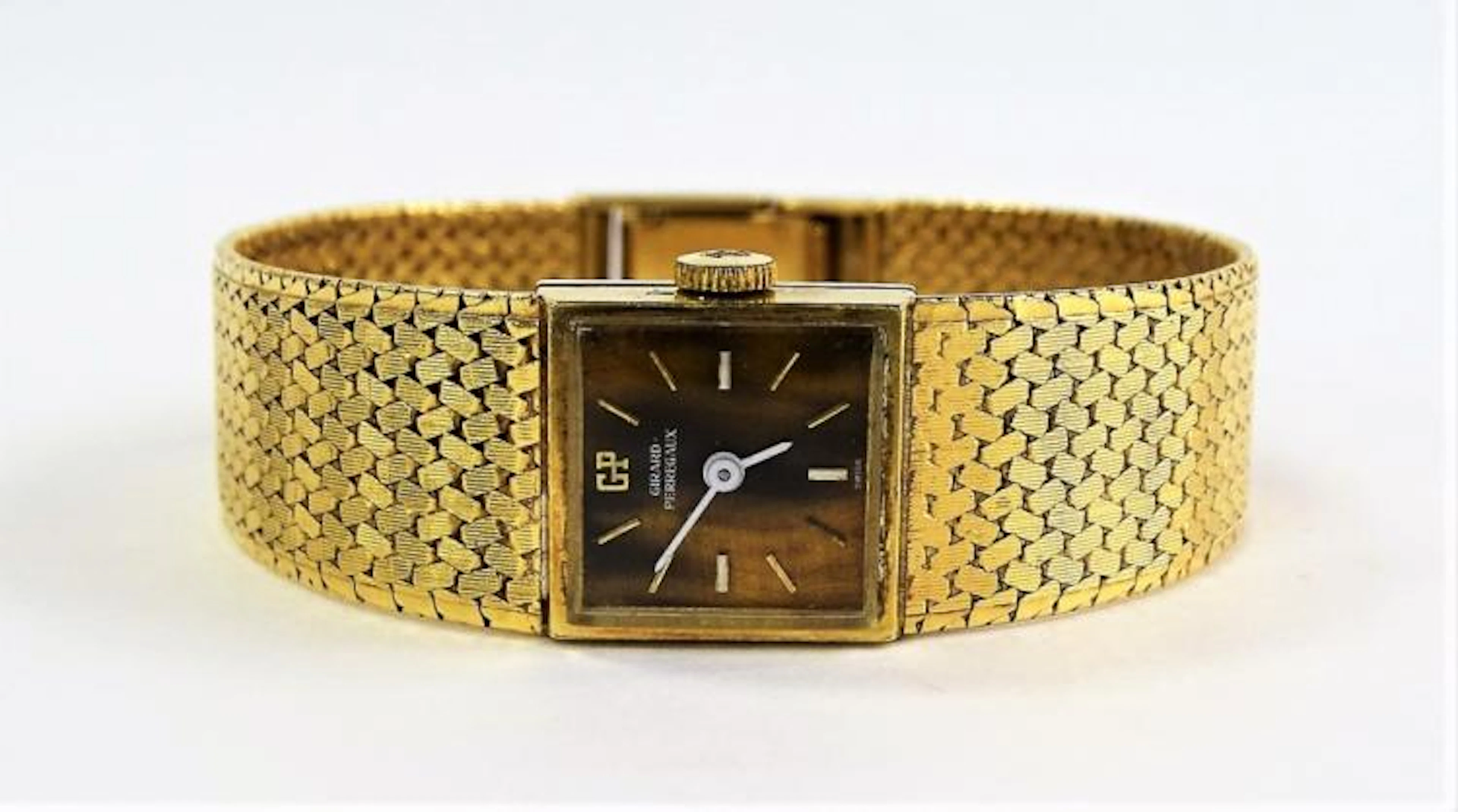 GIRARD PERREGAUX 18KT GOLD TIGER EYE ESTATE WATCH