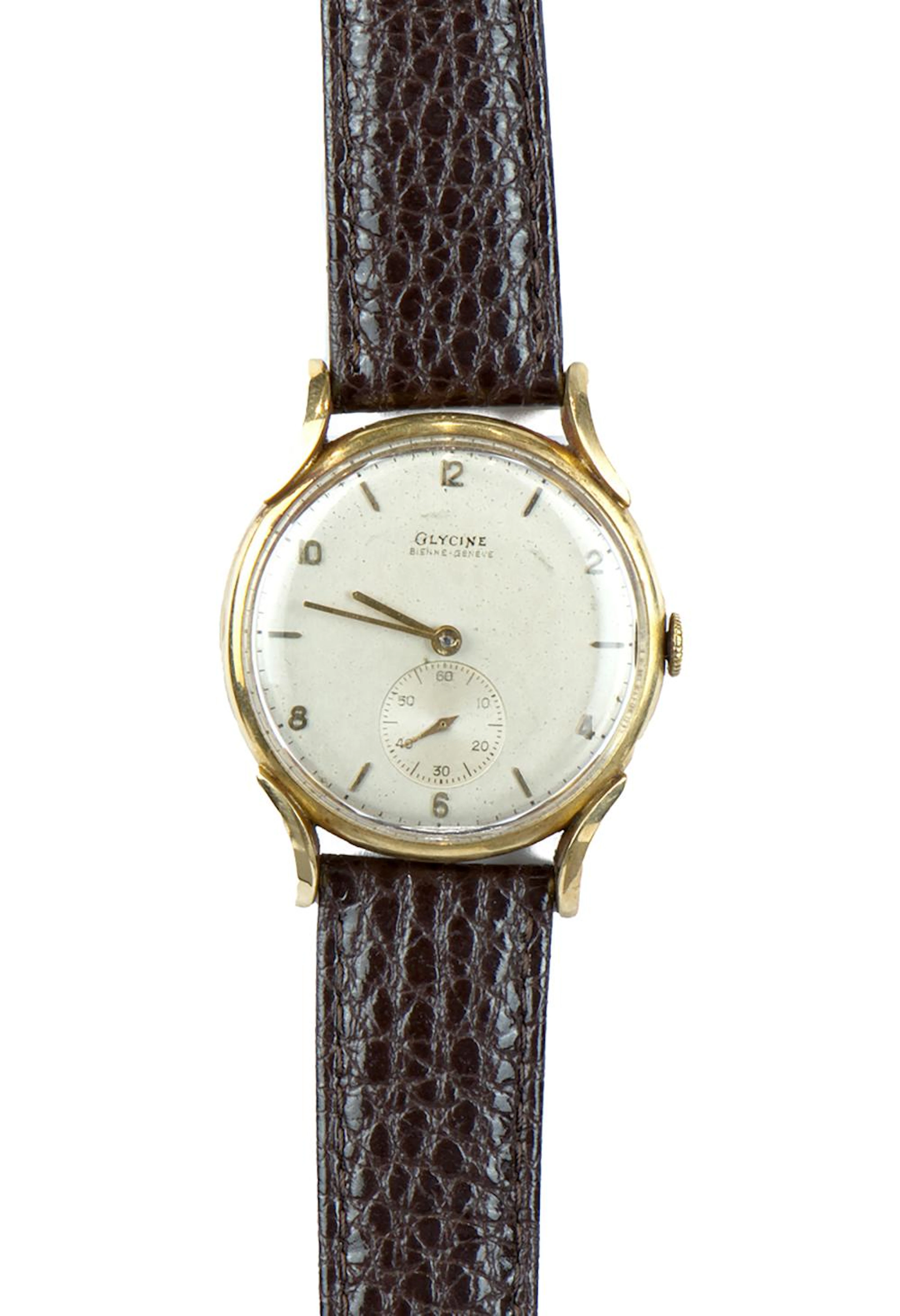 GLYCINE, Bienne - Genève, ca.1950 Ref. 36375 En or jaune 18K anses cornes,