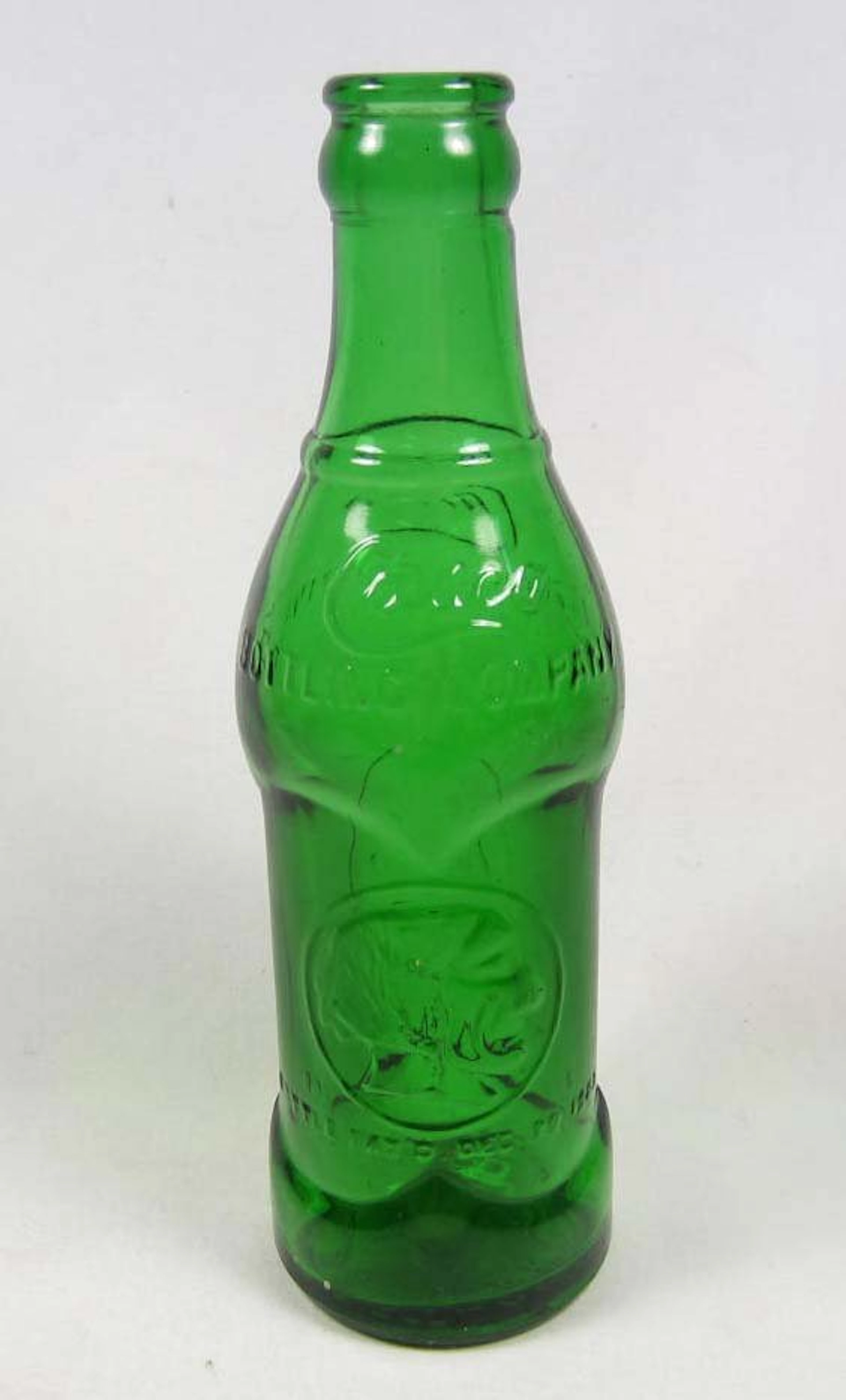 Vintage casco glass bottle w/ indian head graphic