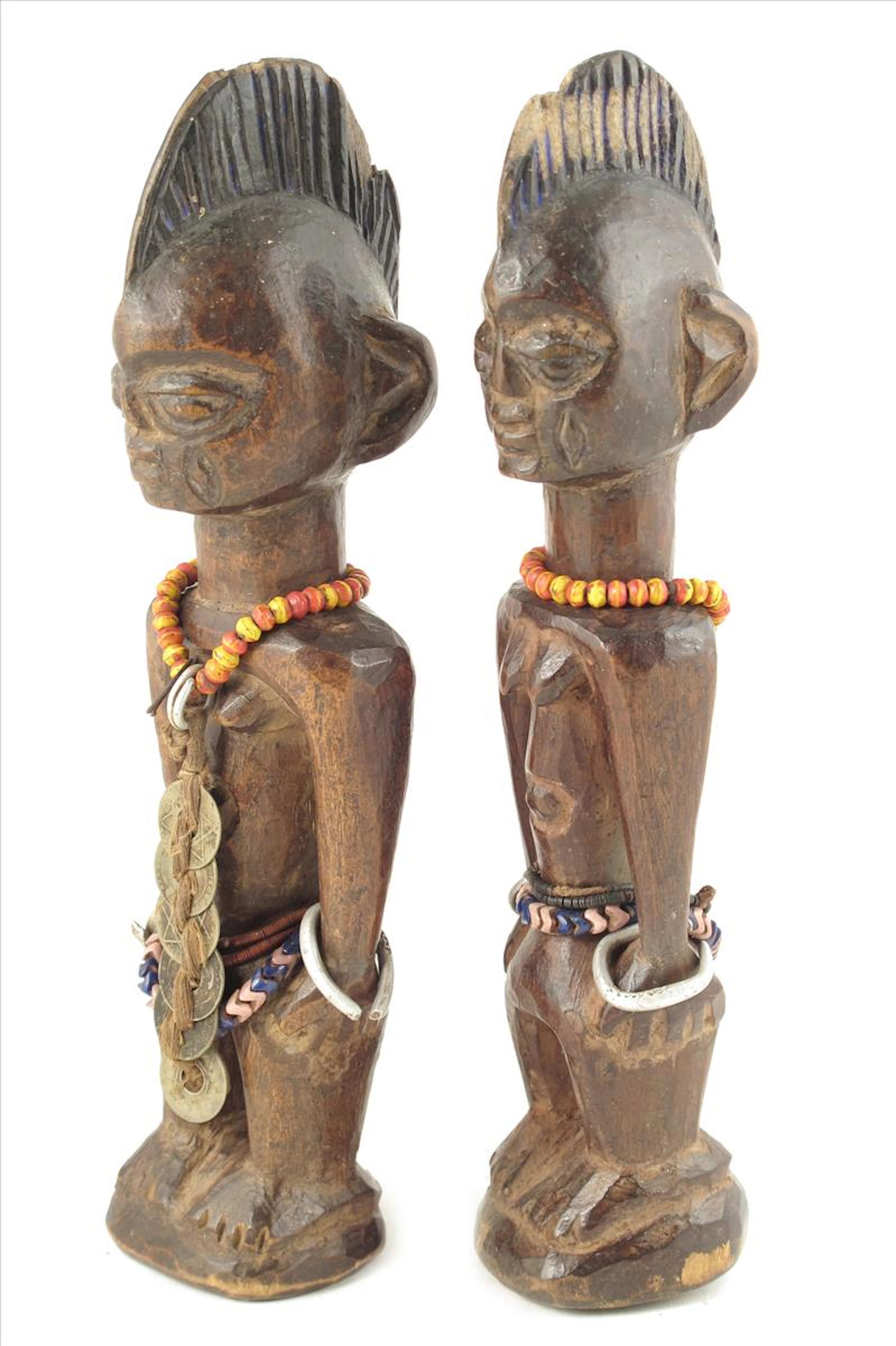 A pair of Yoruba Ibeji twin female figures