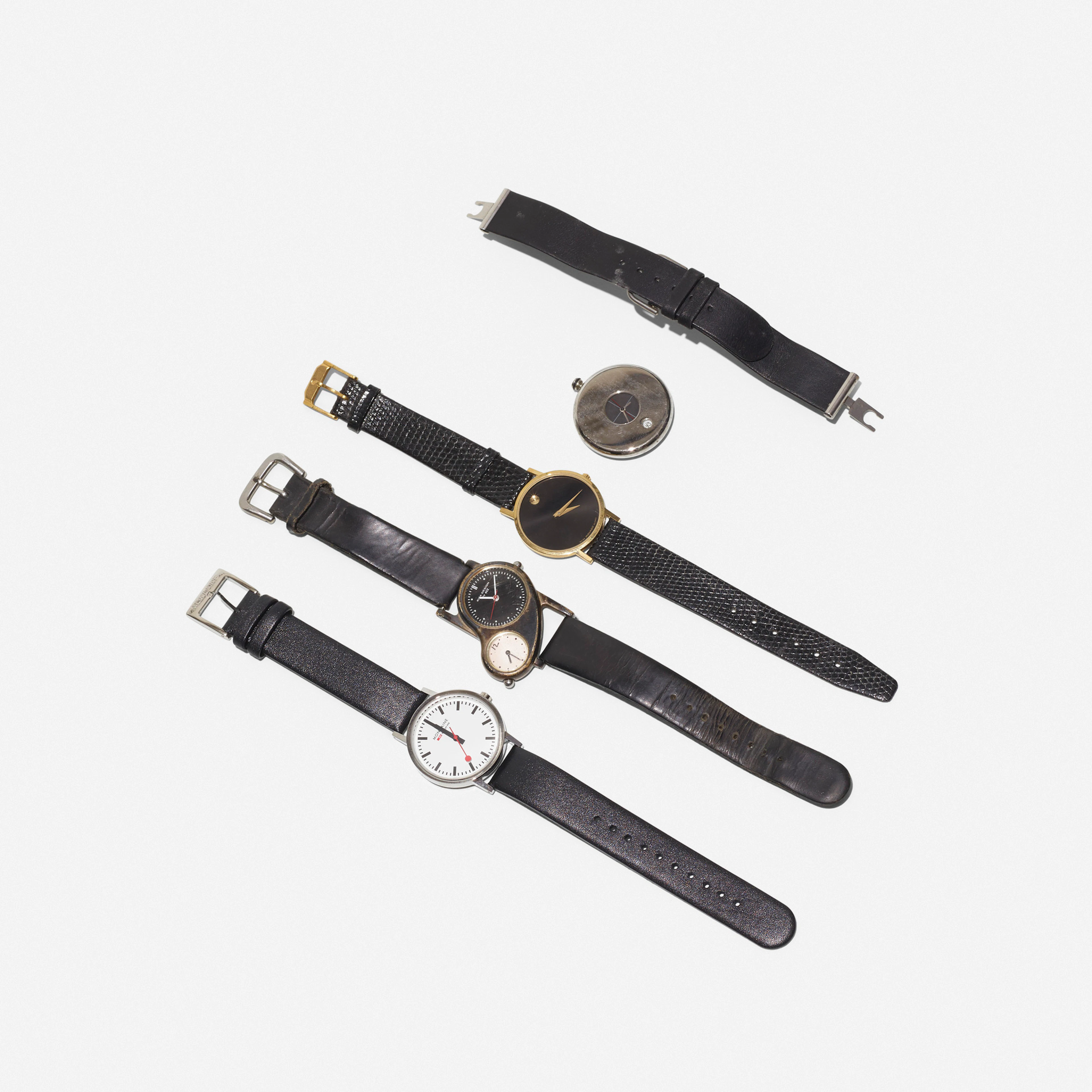 collection of four wrist watches