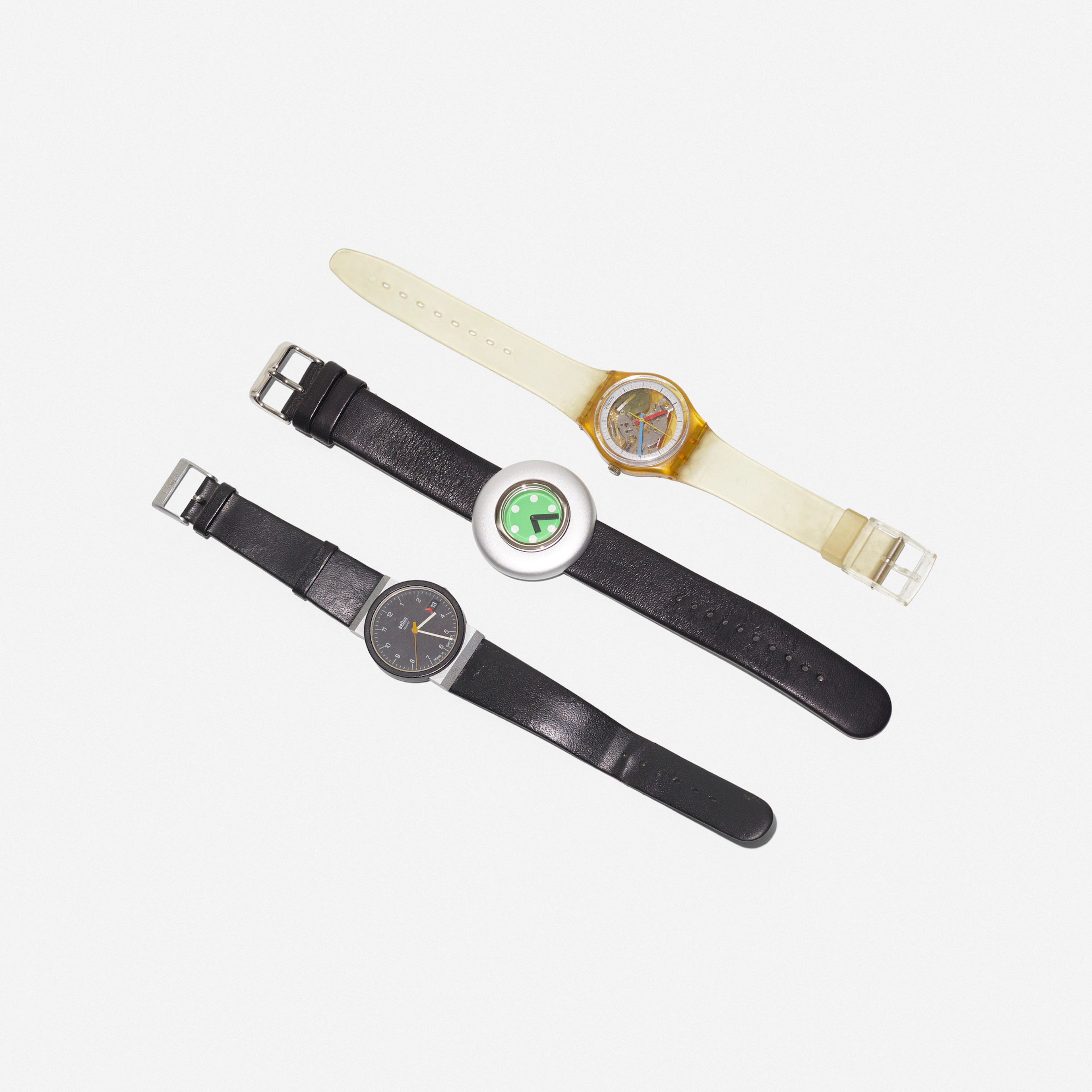 collection of three wrist watches