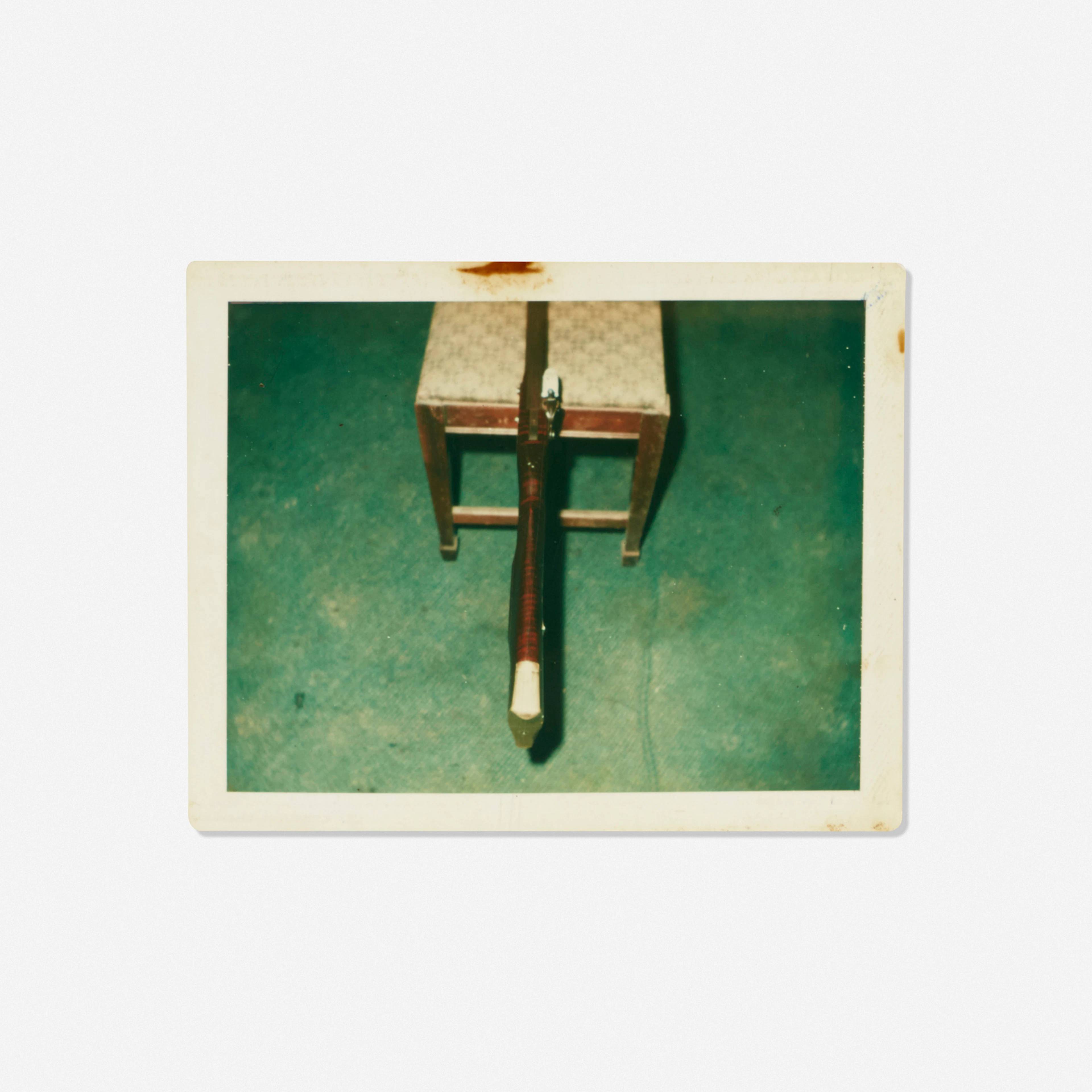 Untitled (Rifle on a Chair)