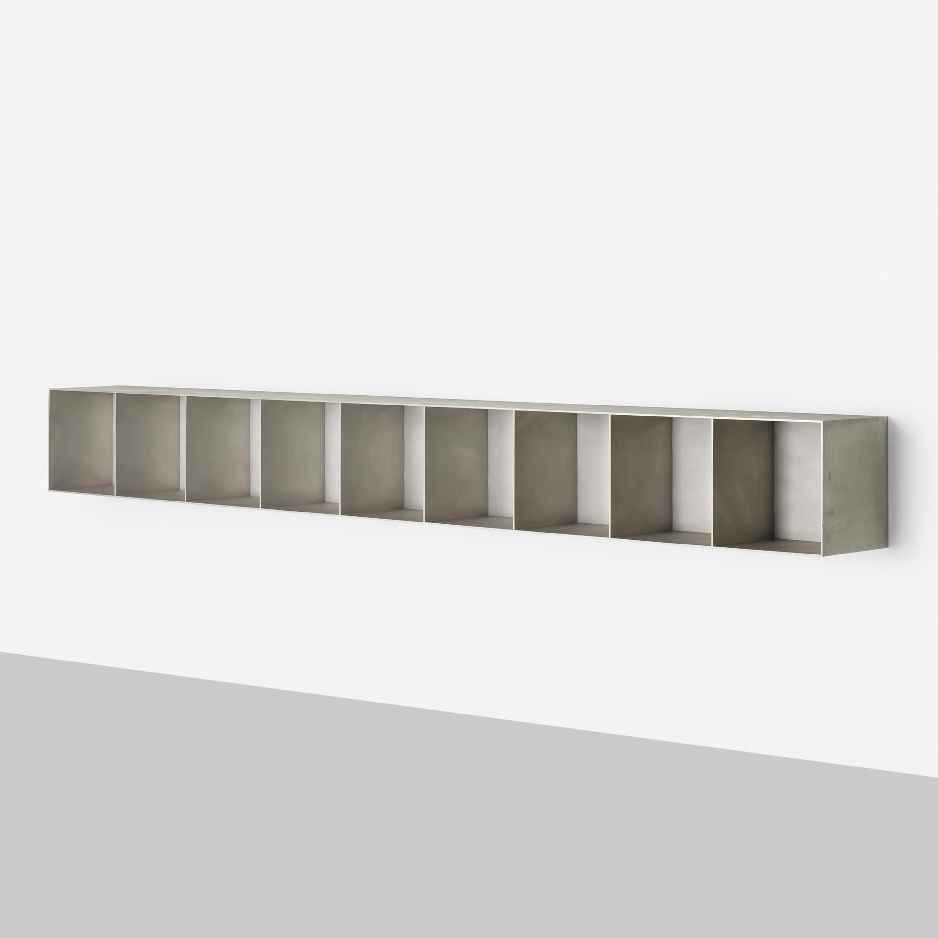 Unique wall-mounted bookcase – Maarten van Severen