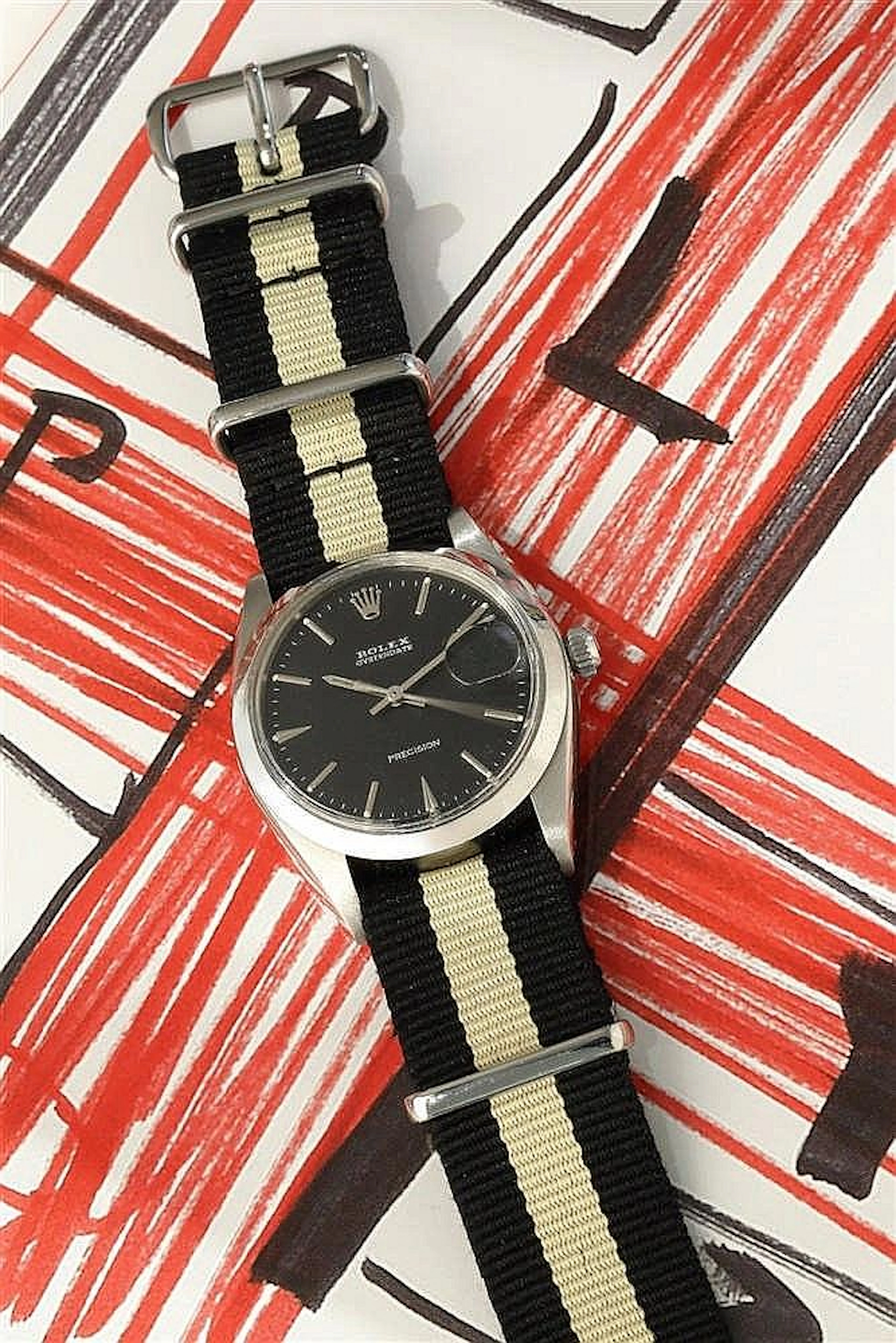 ROLEX PRECISION OYSTER DATE Référence : 6694 Vers