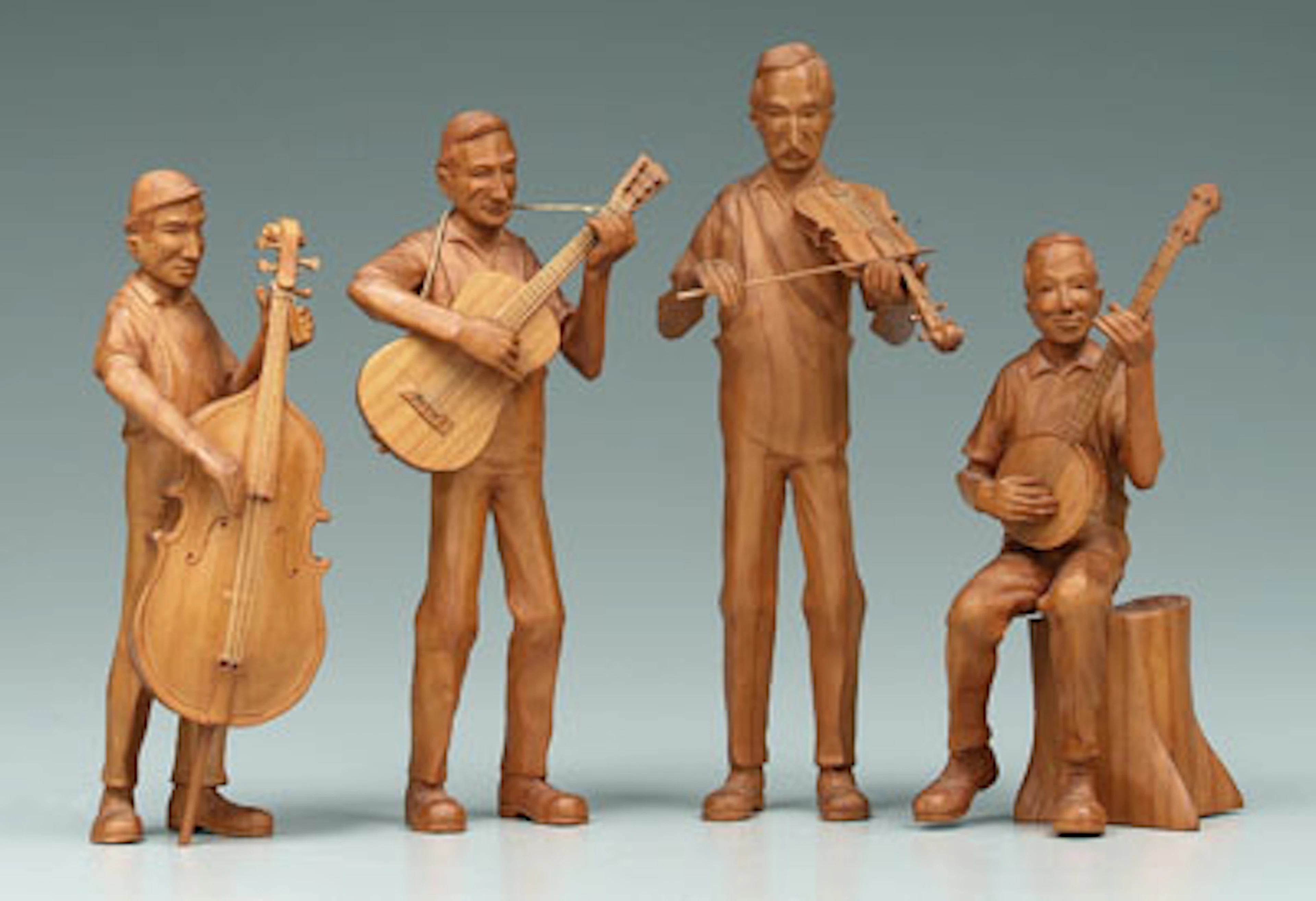 Four Wade Martin carvings