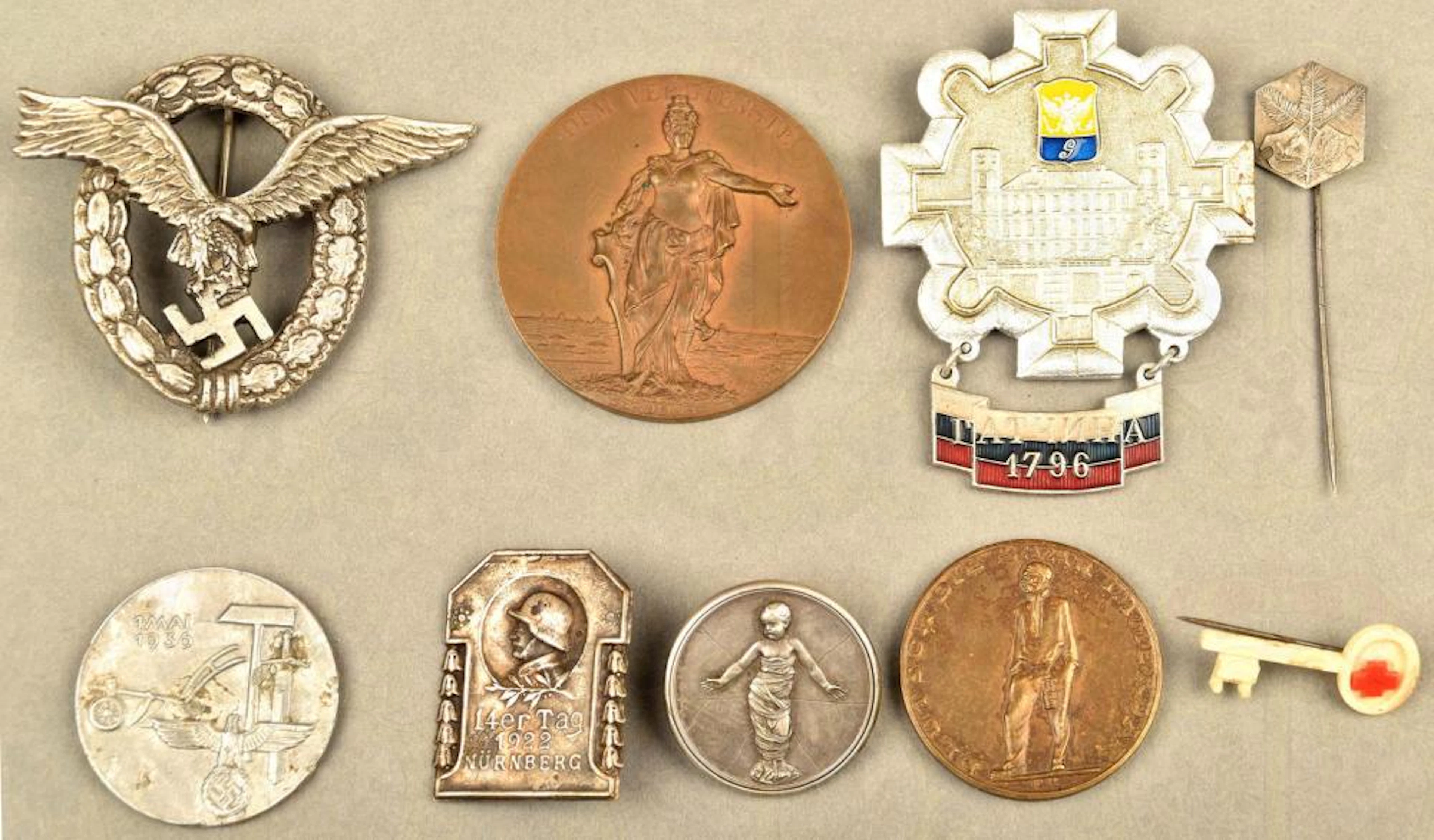 10 BADGES AND PLAQUES