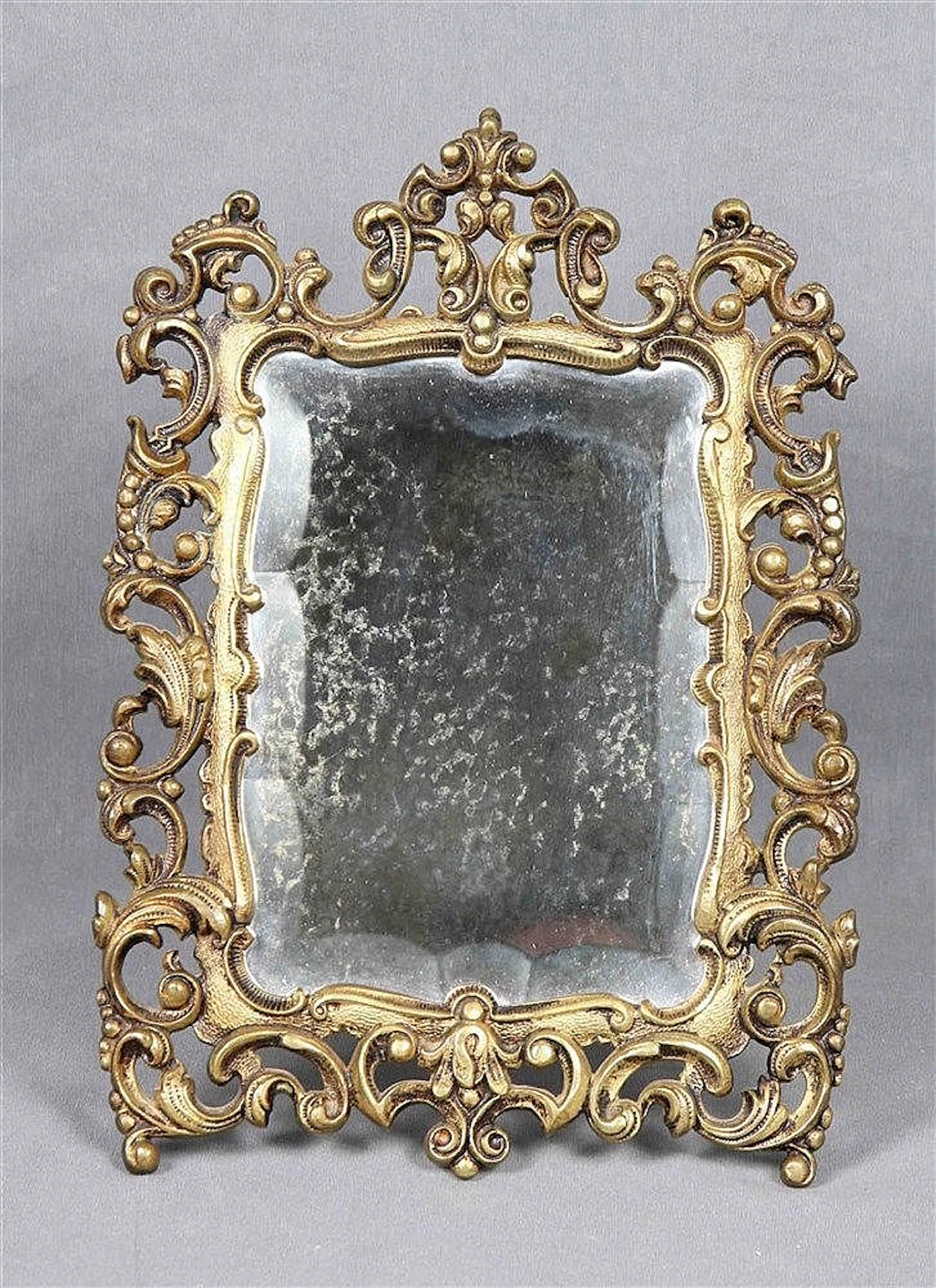 A GILT-BRONZE TABLE MIRROR, 19TH CENTURY