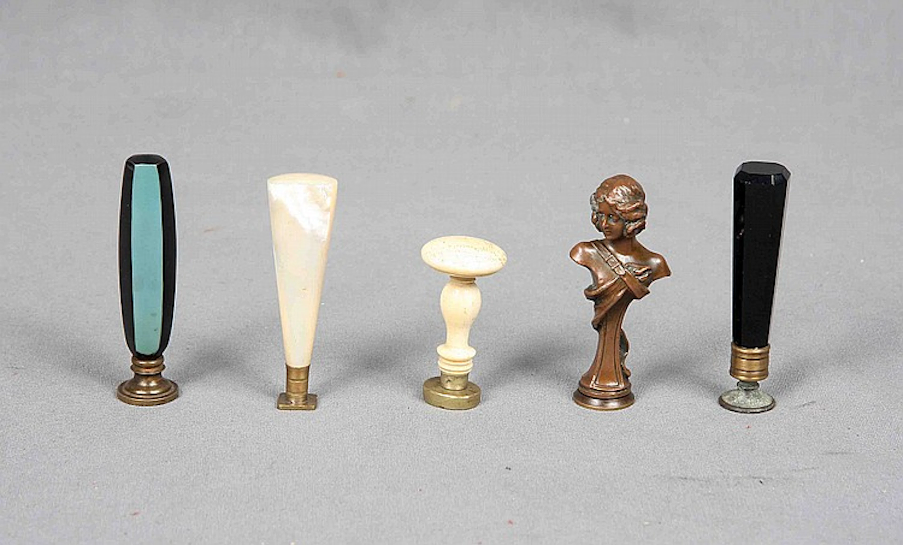 A GROUP OF FIVE ART DECO STYLE DESK SEALS