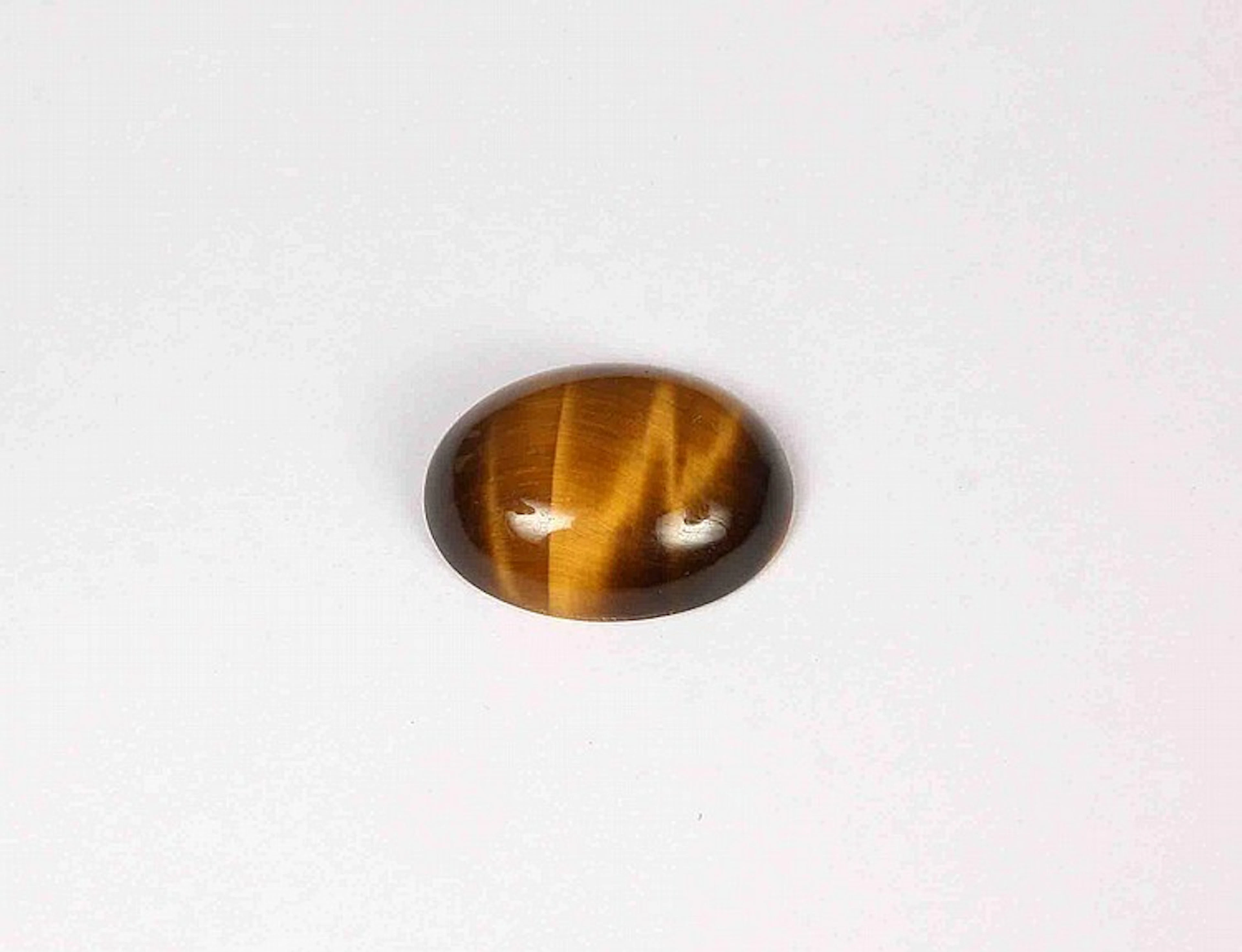 Ojo de tigre oval, talla cabujón.