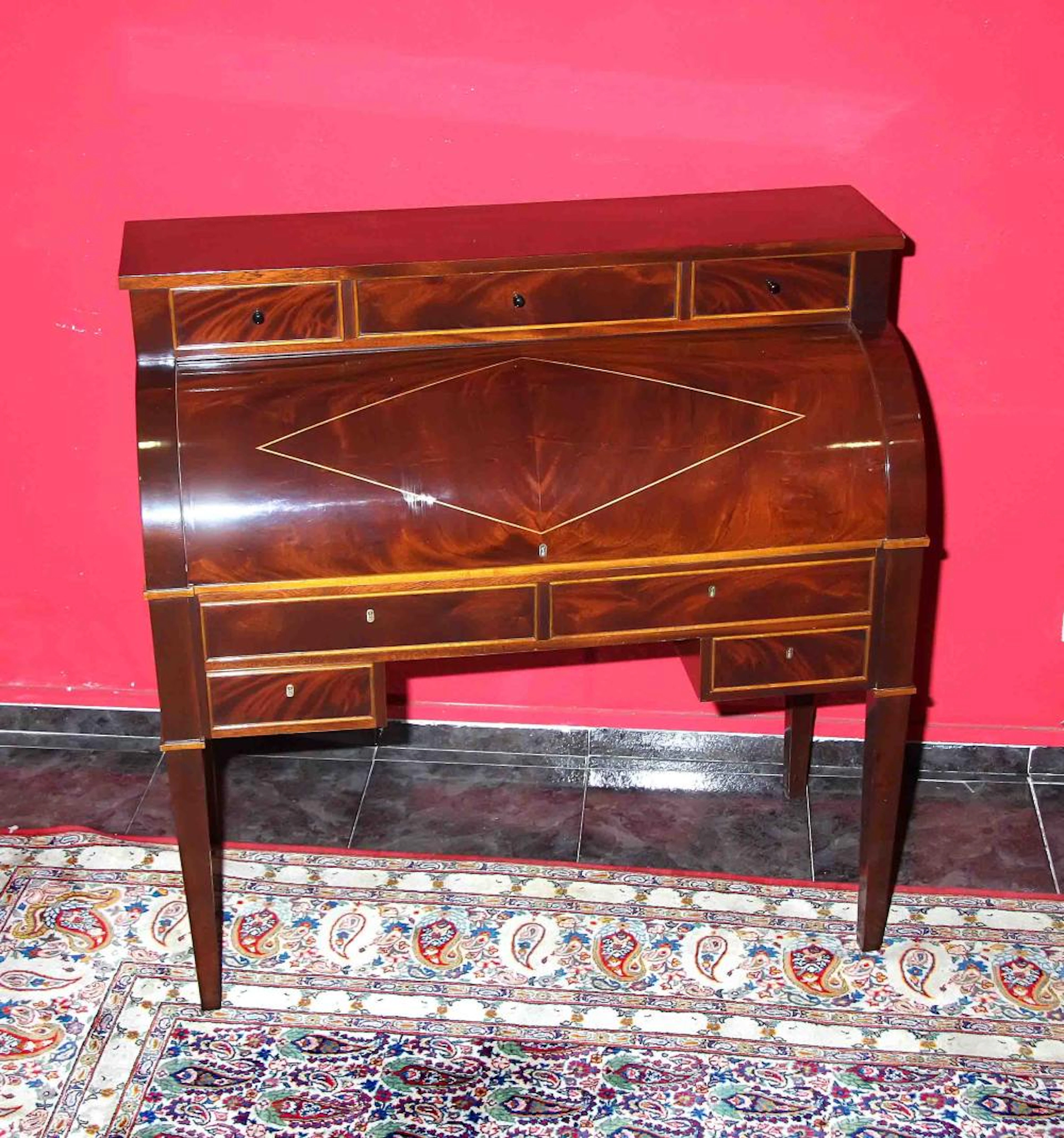 Bureau desk in noble wood. Top with three drawers;